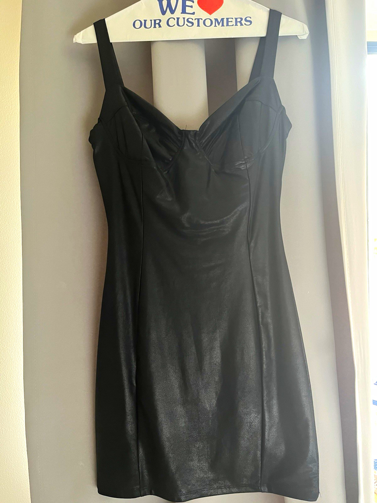 Nordstrom Women’s Black Solid size M fitted black mini dress( never been used)