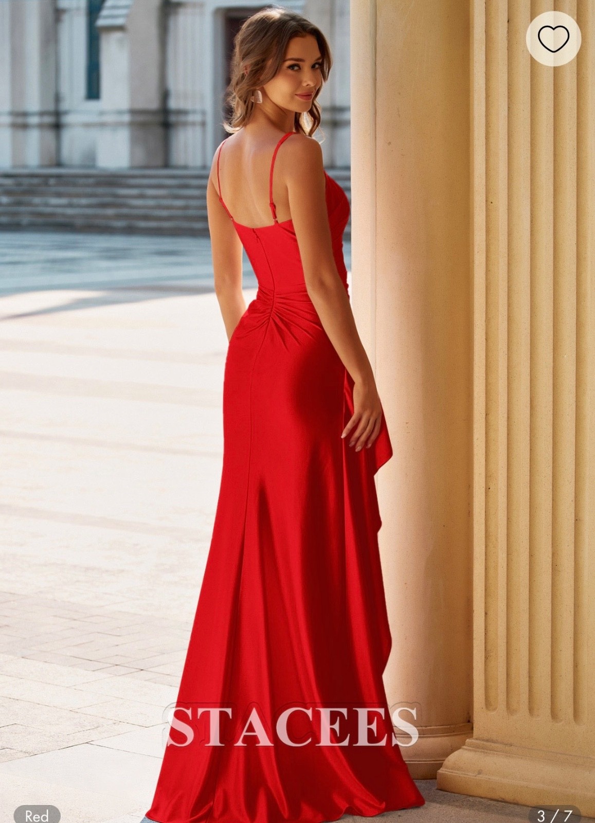 Stacees red prom dress with a flattering square neckline and elegant draped side
