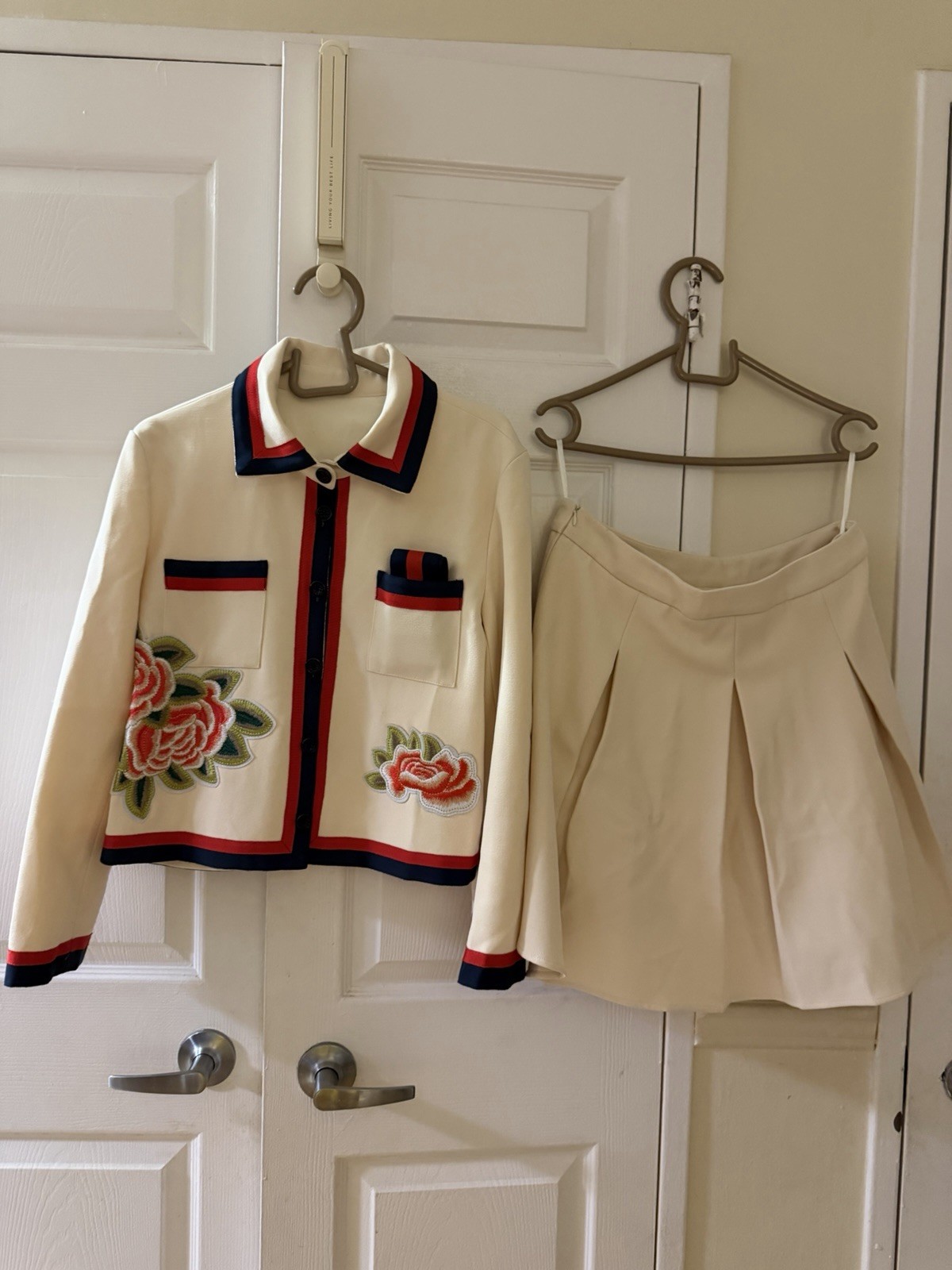 Cream Floral Embroidered Two-Piece Jacket & Skirt Set with Red-Blue Trim