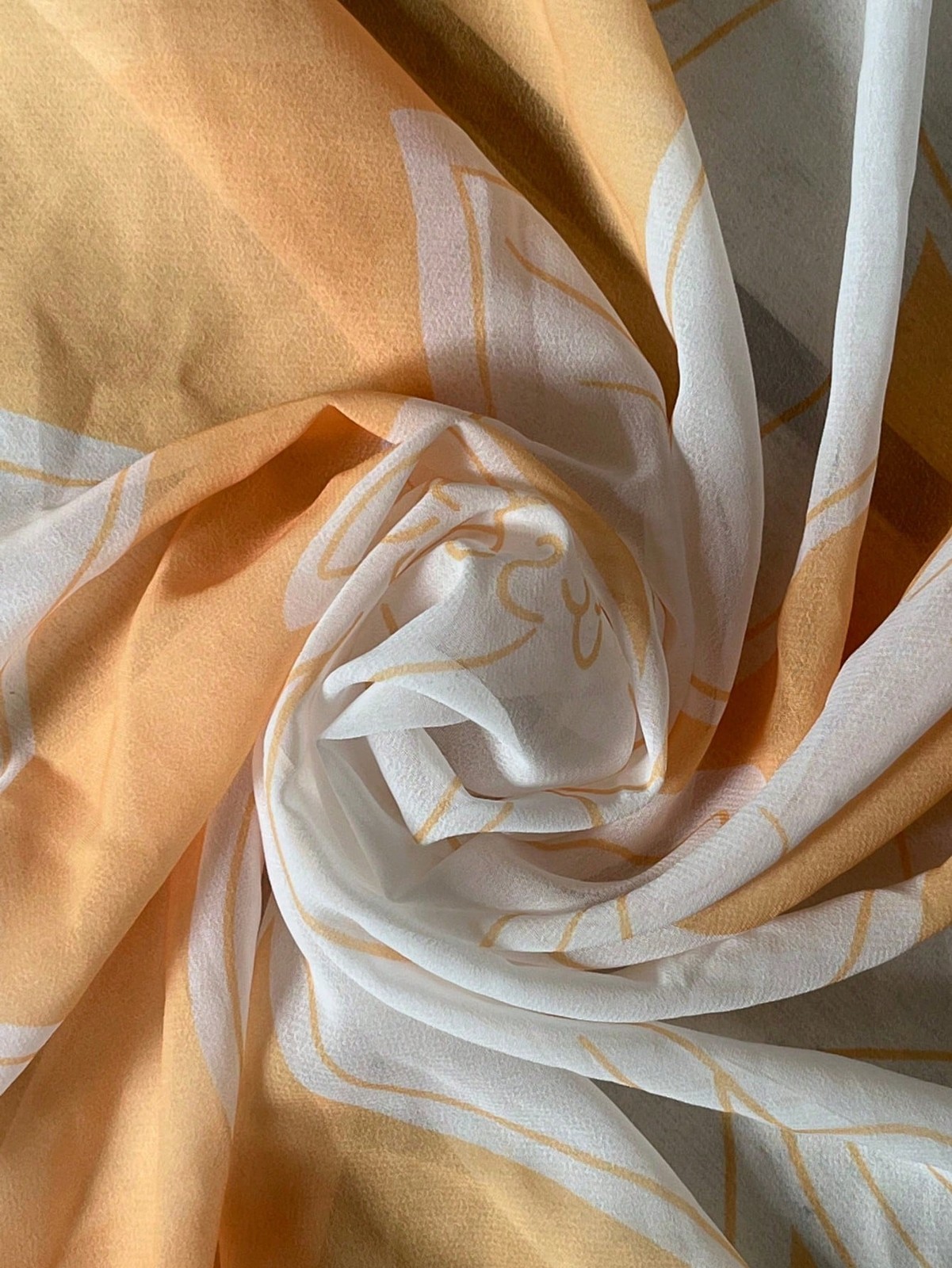 Elegant long dress with all over pattern in yellow