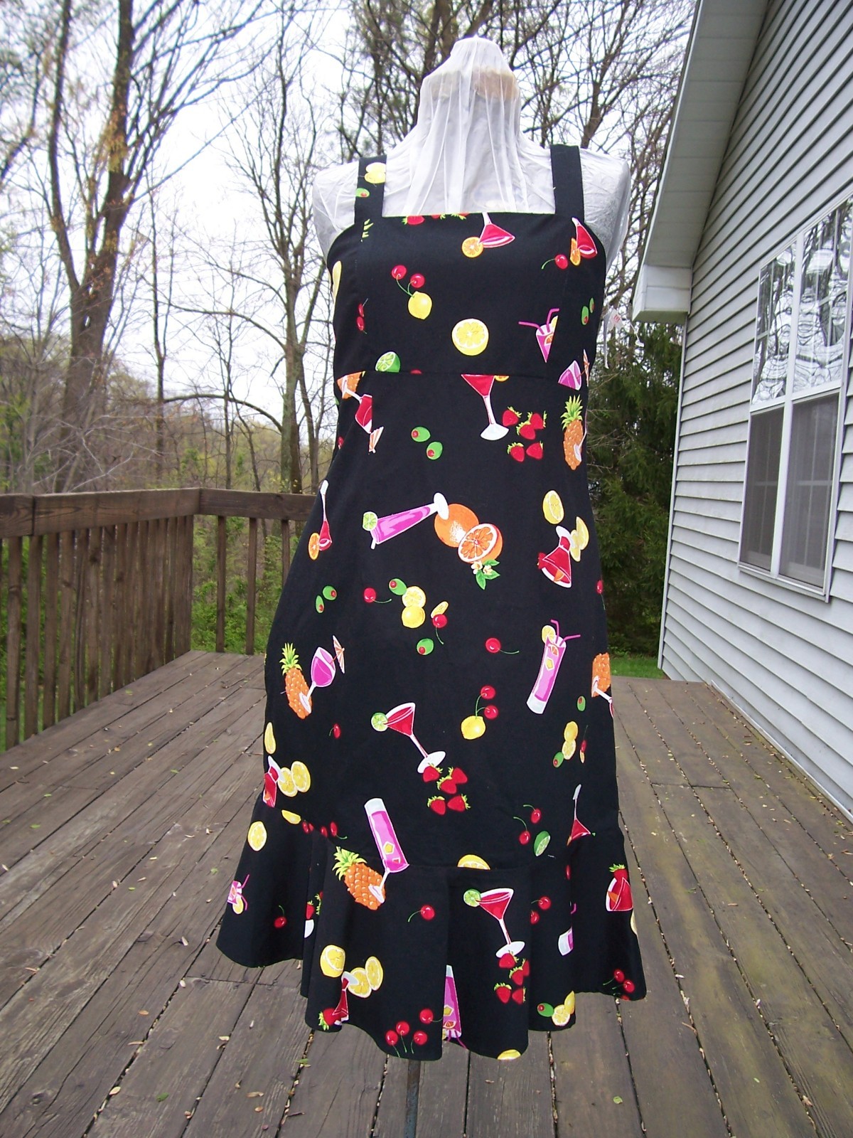 Black Sundress with Colorful Flare Cute dress with fun fruit and cocktail motif.