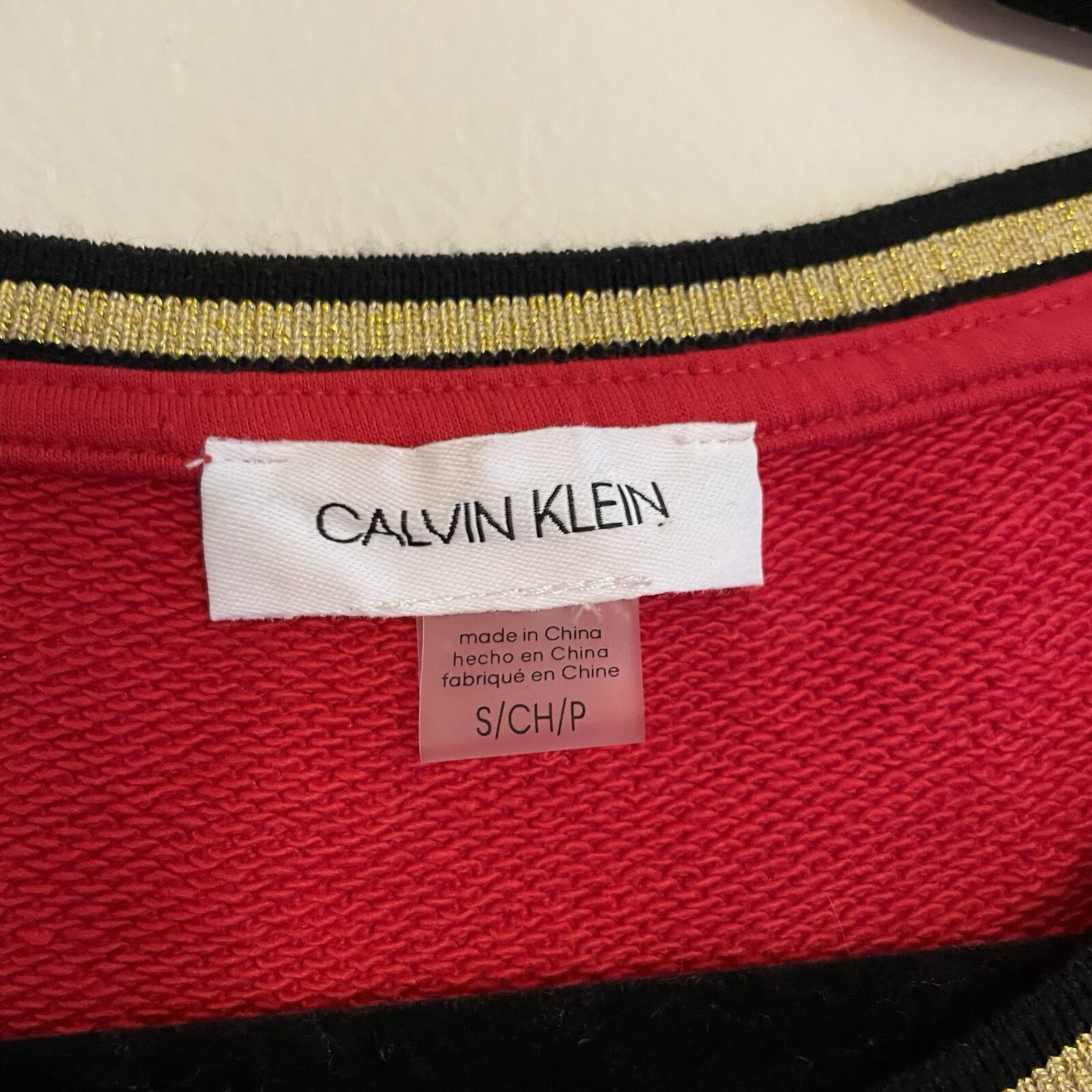 Calvin Klein Women S Red w/Black & Gold Trim Raw Edge Short Sleeve & Hem Dress