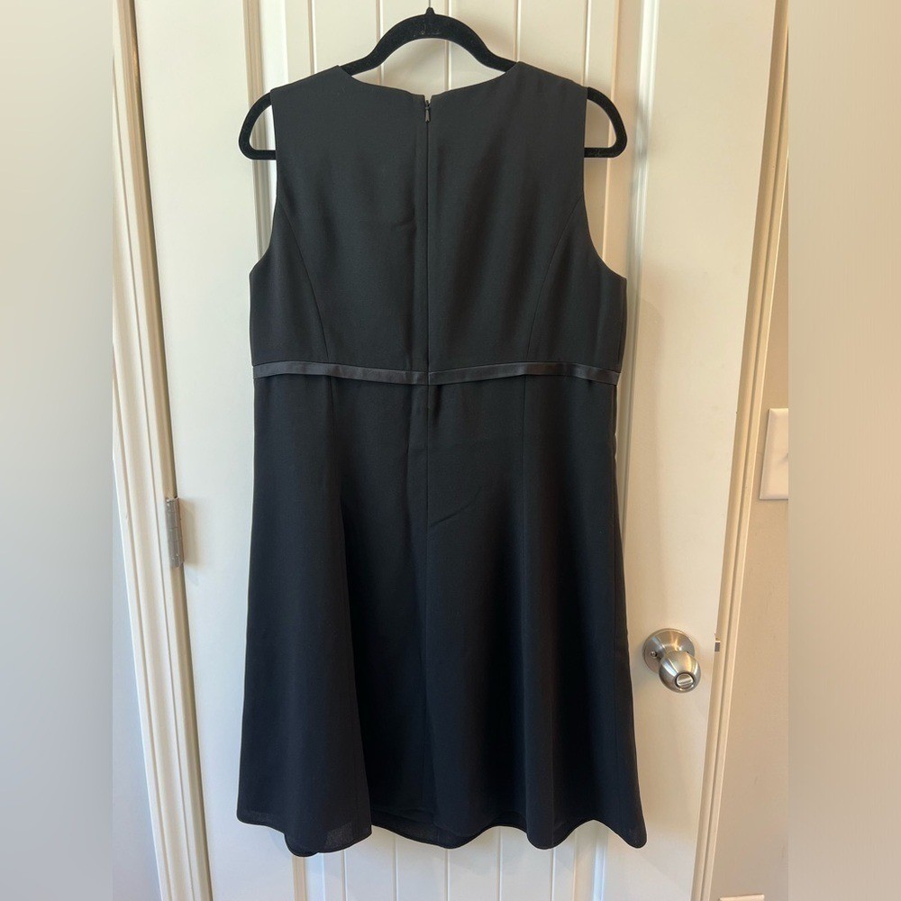 Patrick Collection Sleeveless Black dress with Satin Bow detail at waist size 10