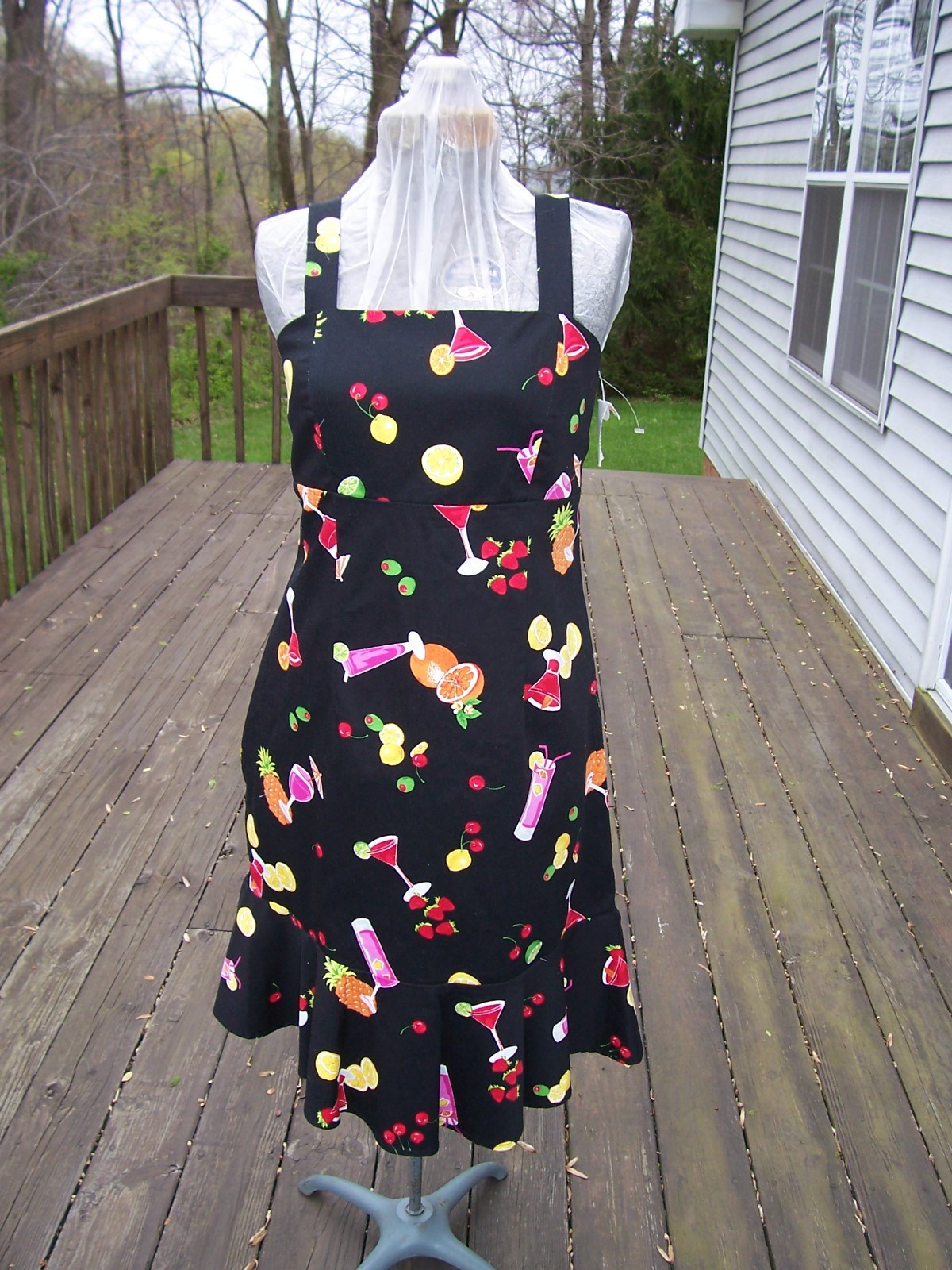 Black Sundress with Colorful Flare Cute dress with fun fruit and cocktail motif.