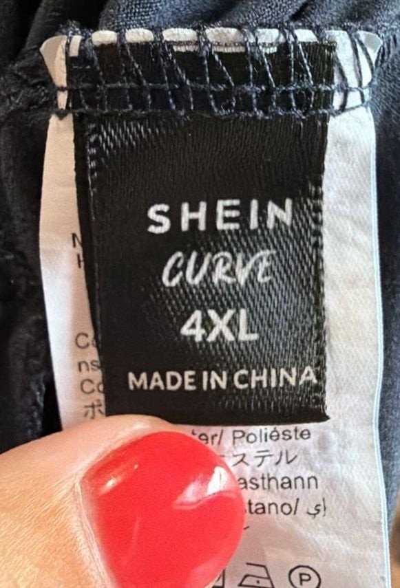 SHEIN Curve Plus Size Solid V-Neck Ruffle Hem Smock Mini Dress