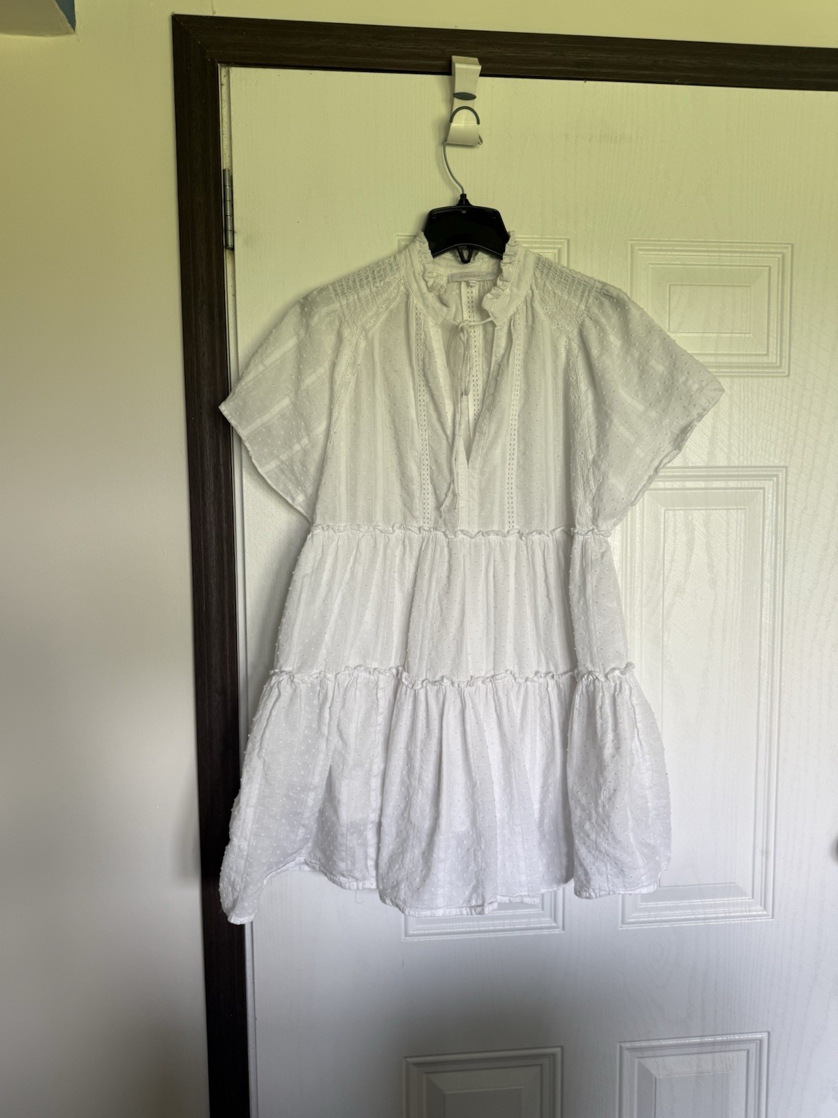 Olivaceous white cotton babydoll tiered mini dress