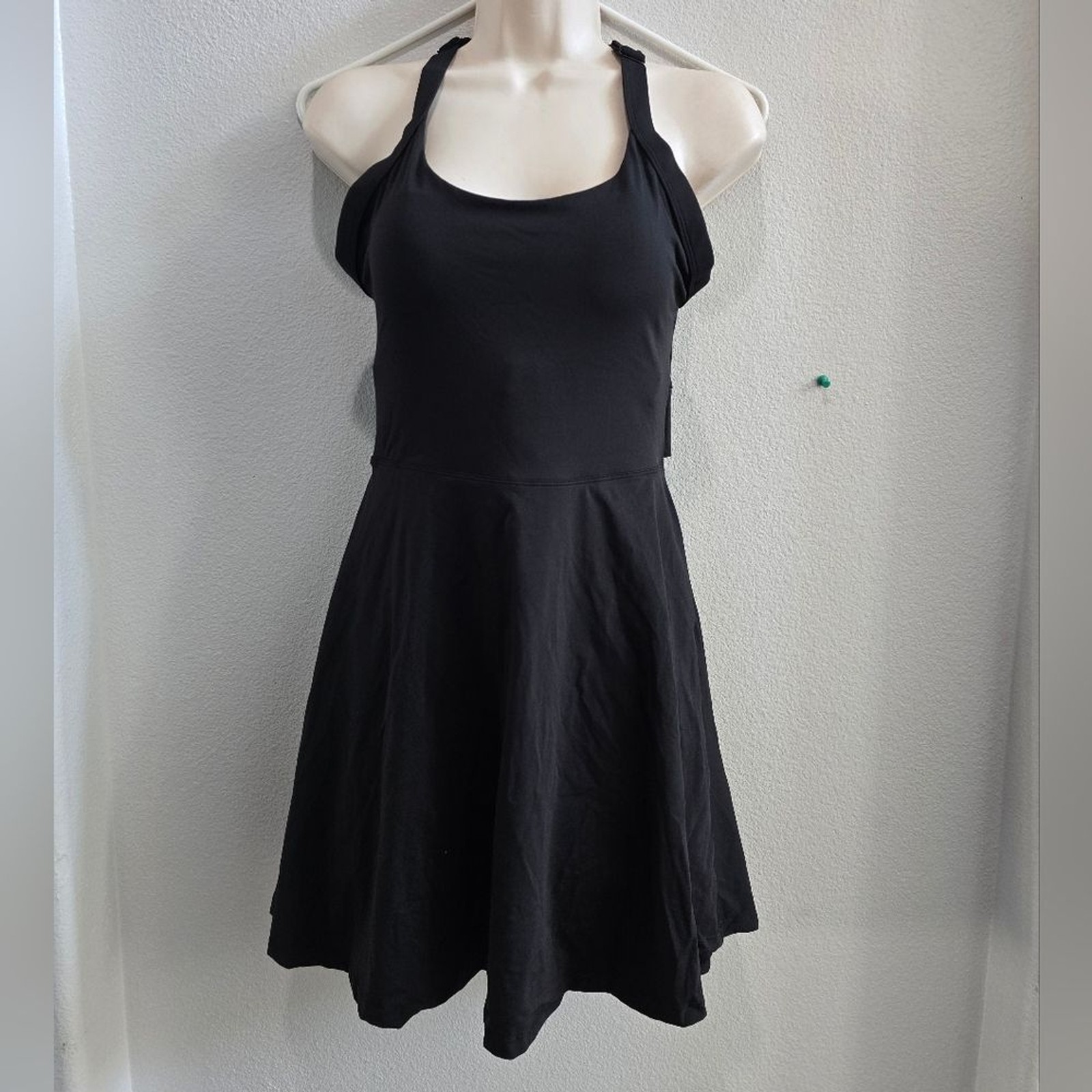 Iuga black strapped athletic dress with attached shorts & hip pockets. medium