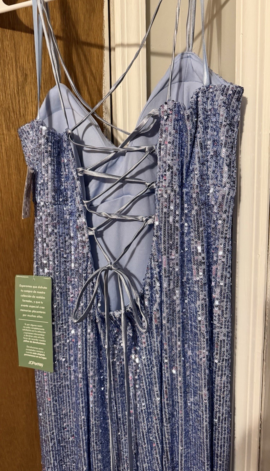 NWT Blue sequin spaghetti strap V-neckline low back, and a high slit Never worn