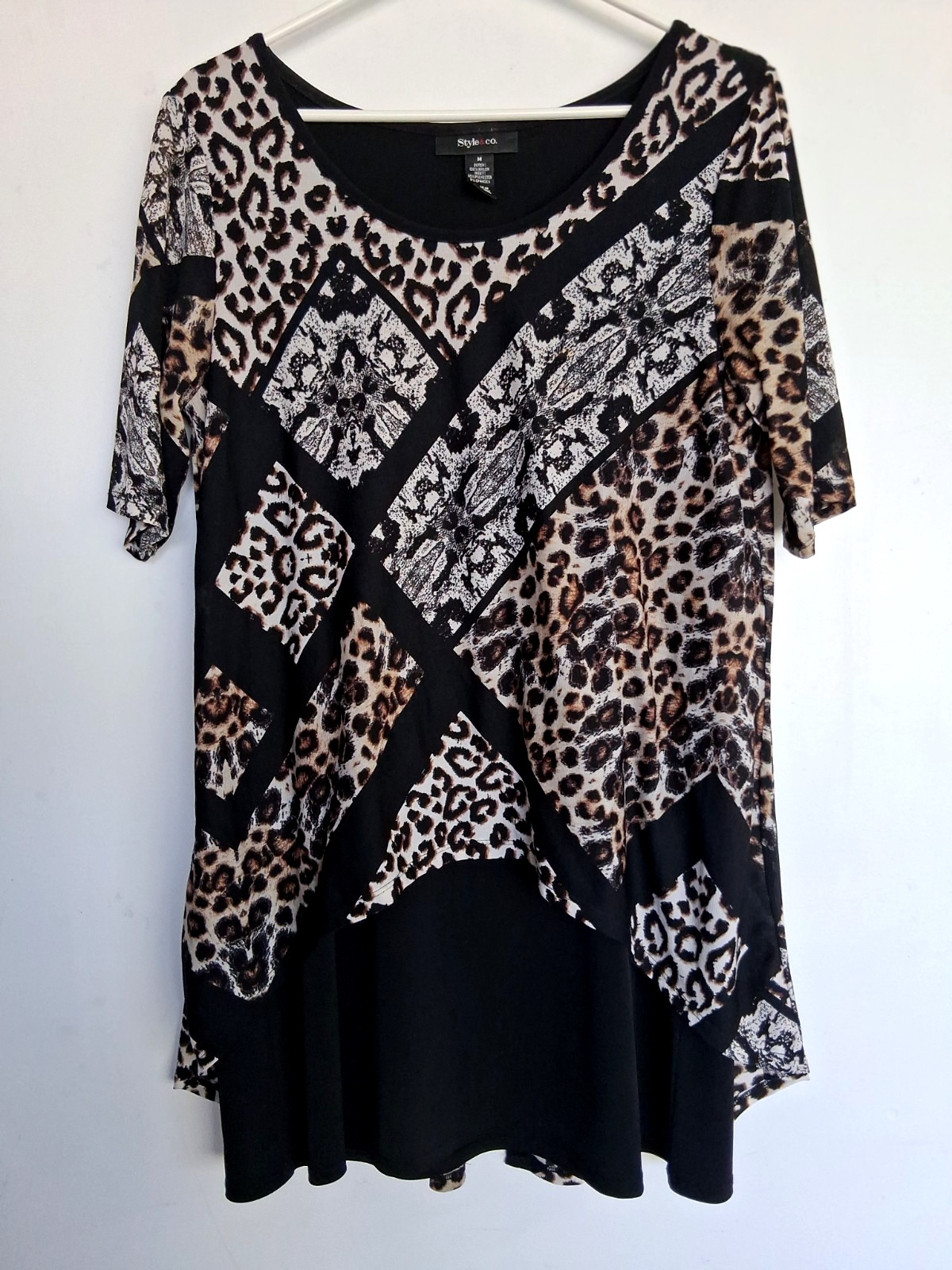 Size M black white brown knee length dress, pattern over sheath. Excellent cond