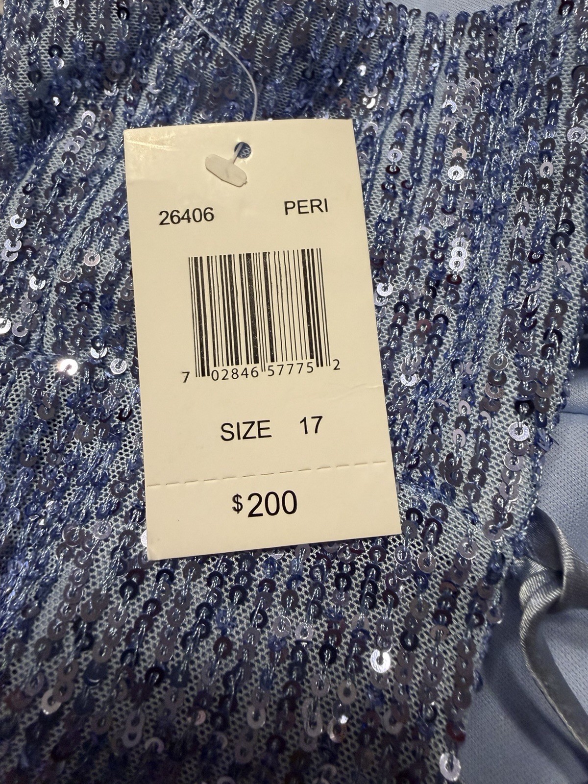 NWT Blue sequin spaghetti strap V-neckline low back, and a high slit Never worn
