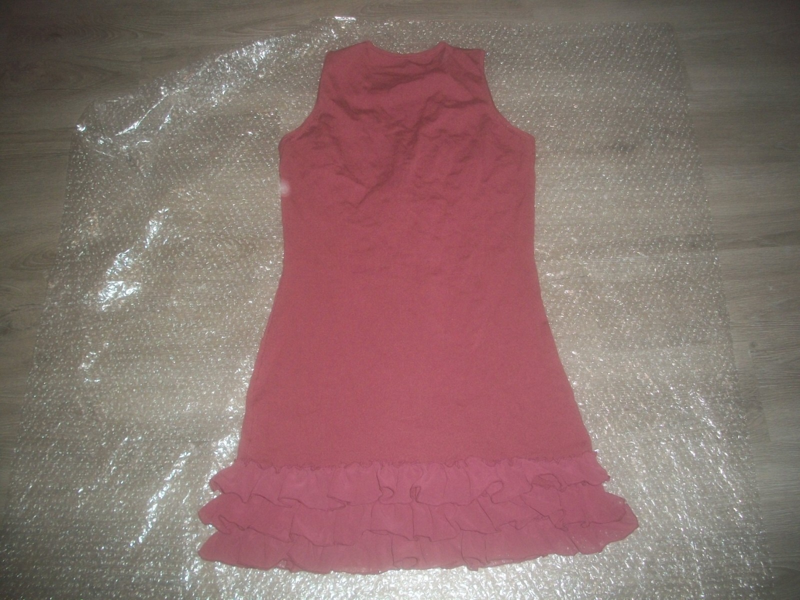 womens knit sleeveless jumper.dress.ruffled.size large