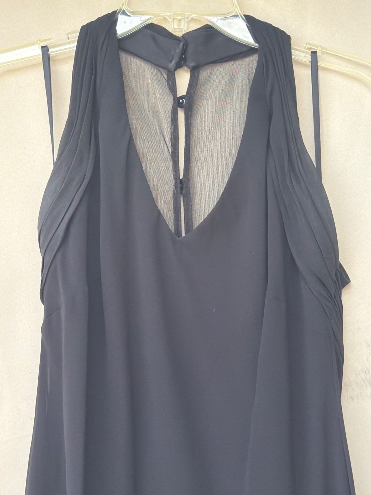 Black Sleeveless Chiffon Dress With Sheer Back & Tiered Ruffle Accent Mid-Length