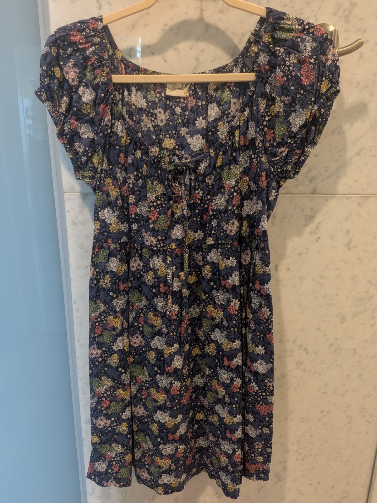 Ladies Blue Flowered Dress with Capped Sleeves and Front Tie. Medium