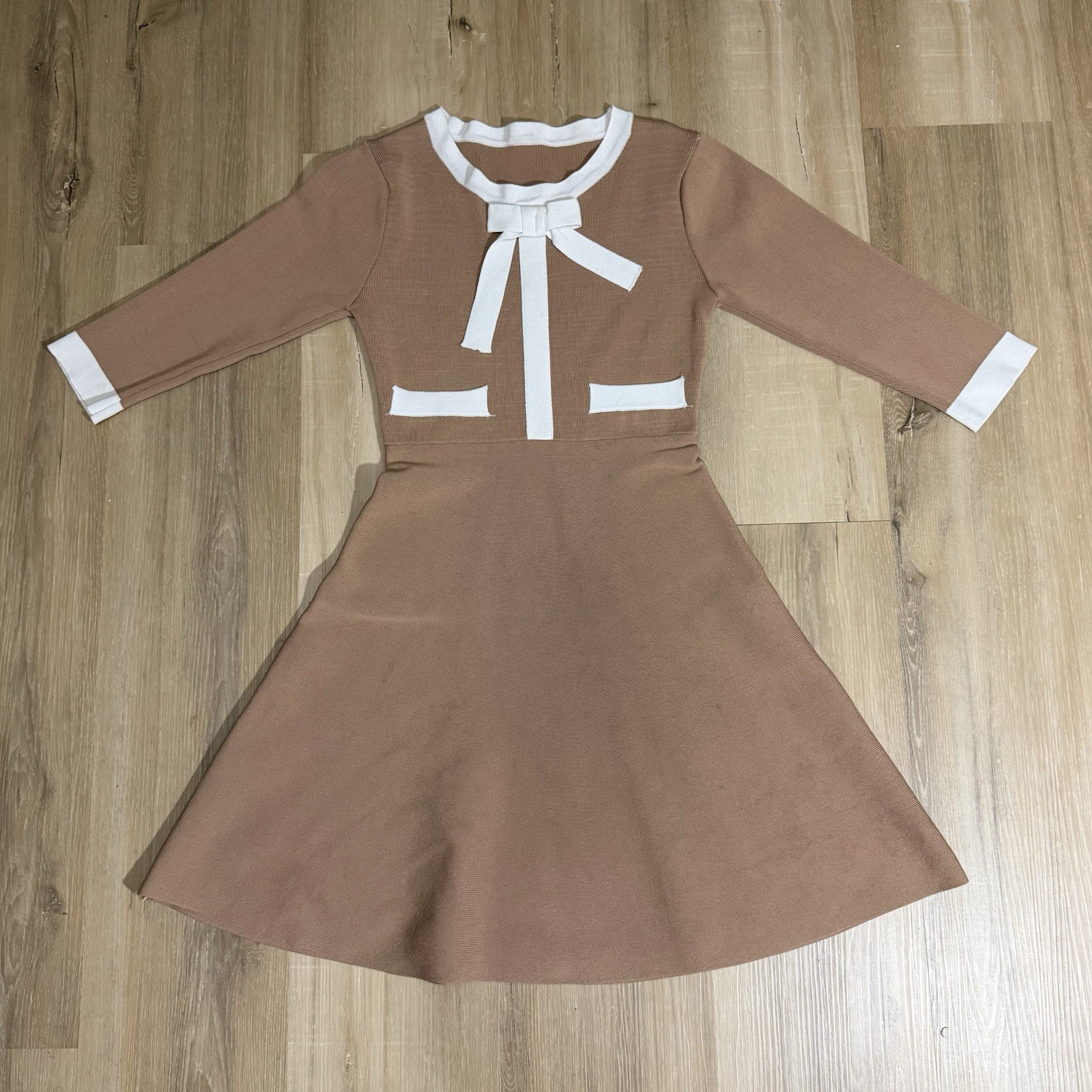 Light Brown And White Flare Skirt Woman’s And A White Bow On Front