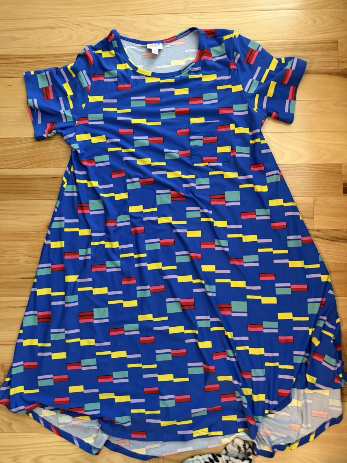 LuLaRoe Carly swing dress featuring a vibrant, multi-colored geometric block XL