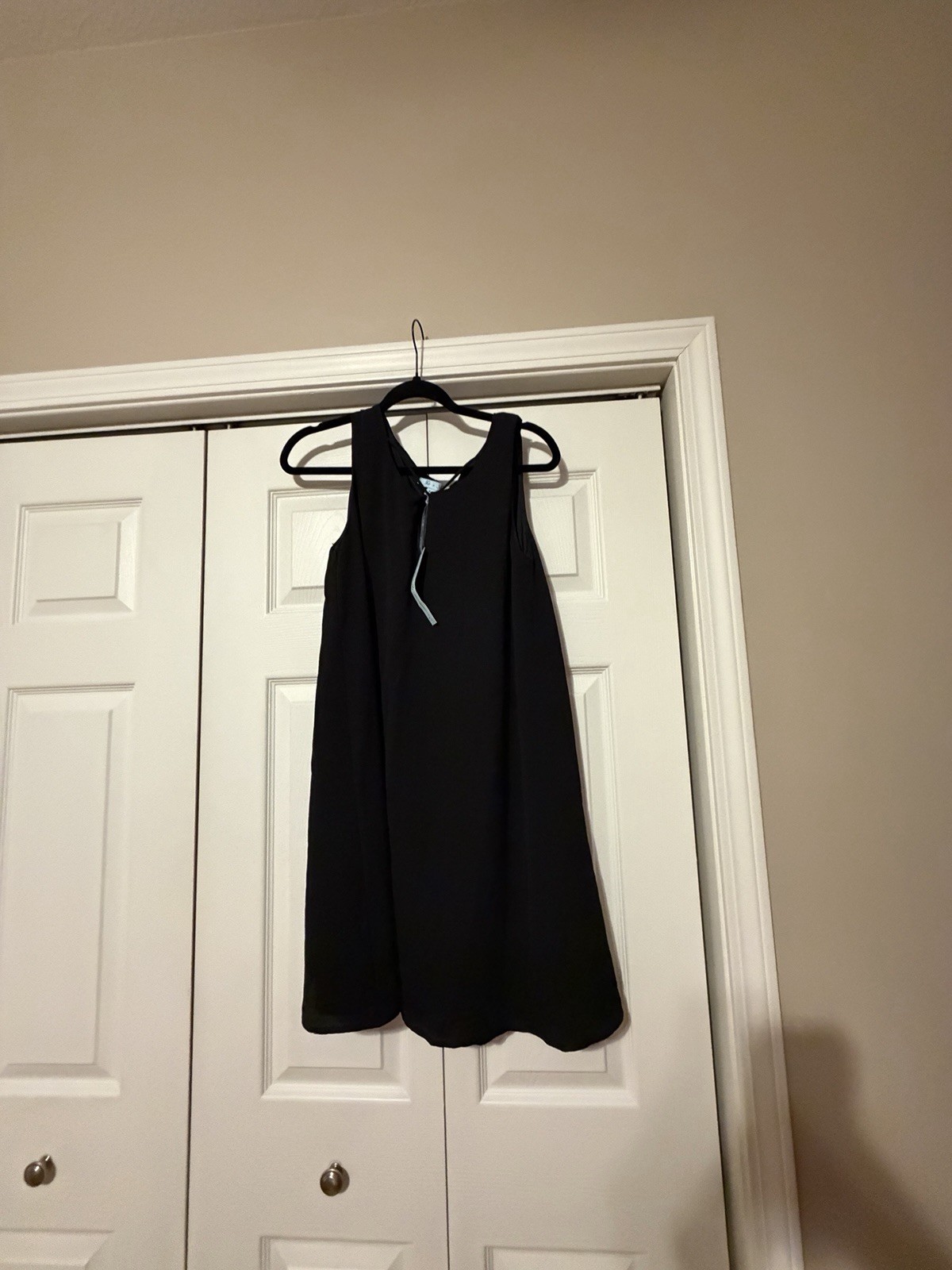 NWT She + Sky black sleeveless dress, a simple and flowy silhouette. Medium