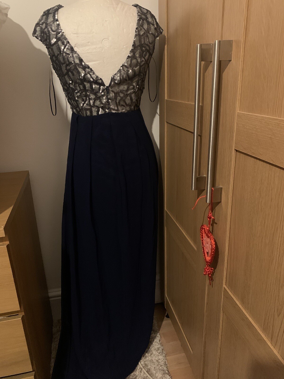 Little Mistress Maxi Dress with hand embellished silver sequins. low cut back.