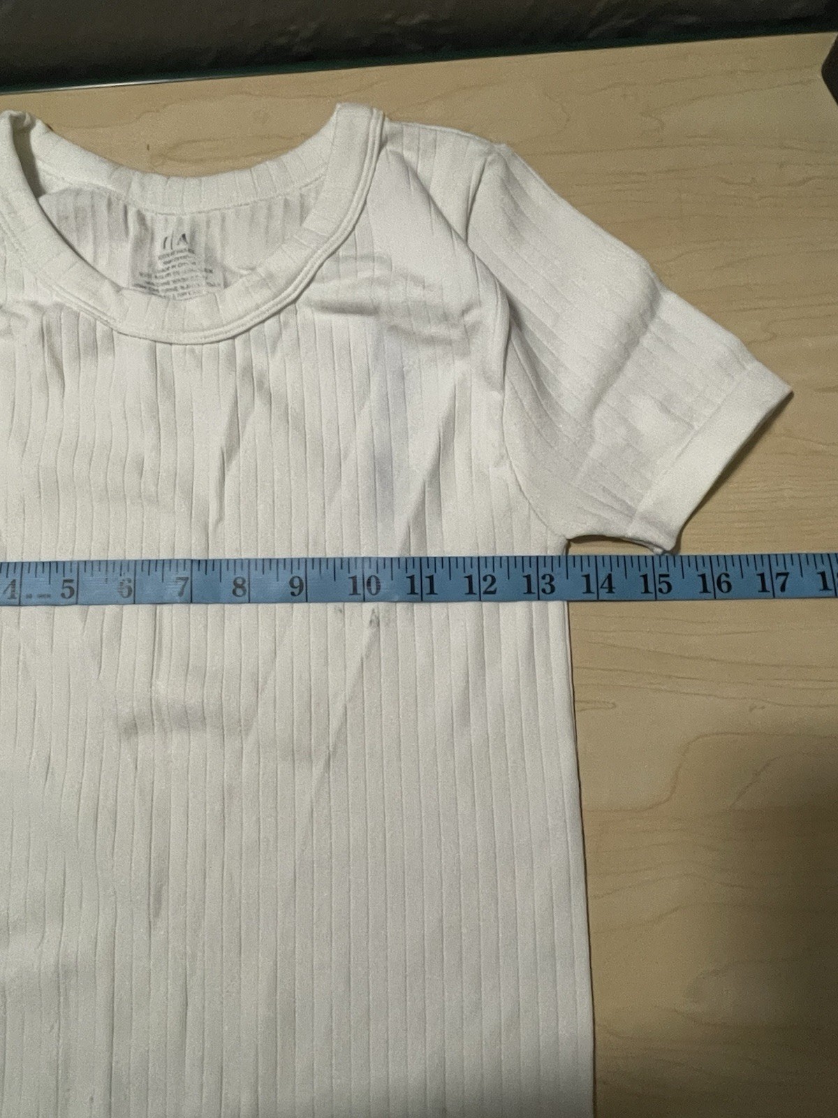 2 women’s dresses: one light blue Shero (size S, wide sleeves) and one white