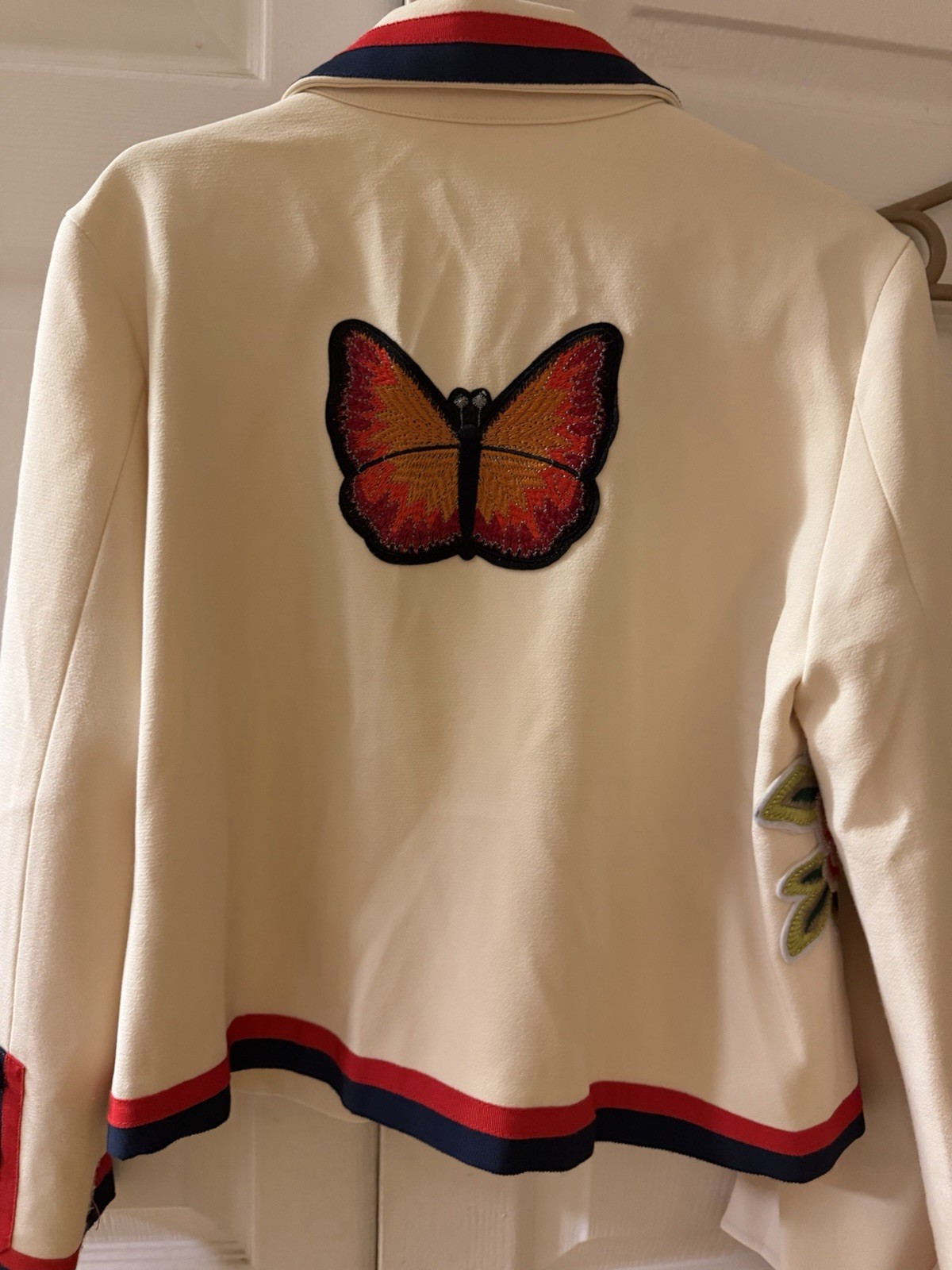 Cream Floral Embroidered Two-Piece Jacket & Skirt Set with Red-Blue Trim