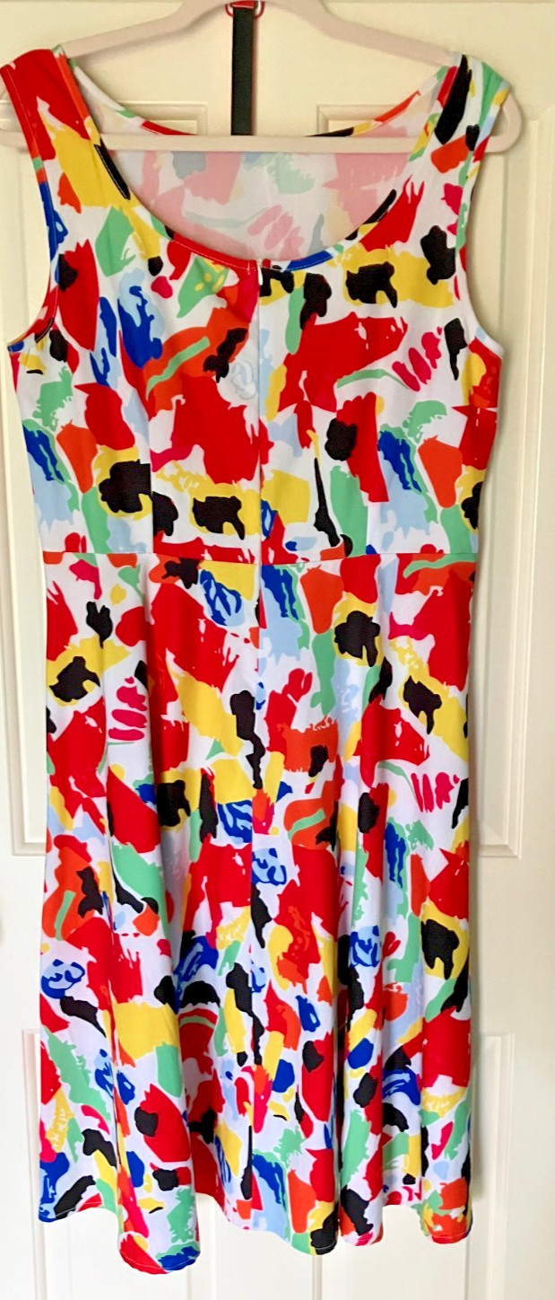 Multi Colored Fit and Flare Sleevless Dress with Swing Skirt and Belt