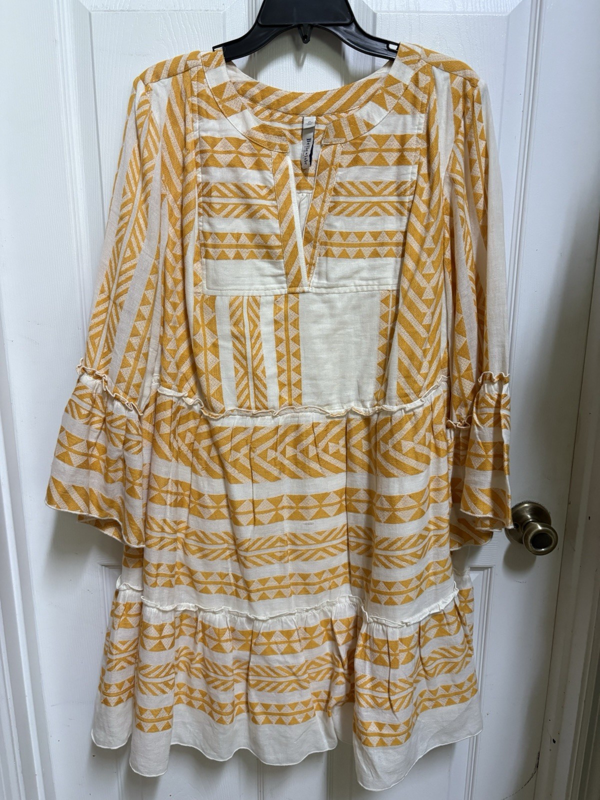 Belle Isle yellow and cream geometric patterned dress with ruffle sleeves
