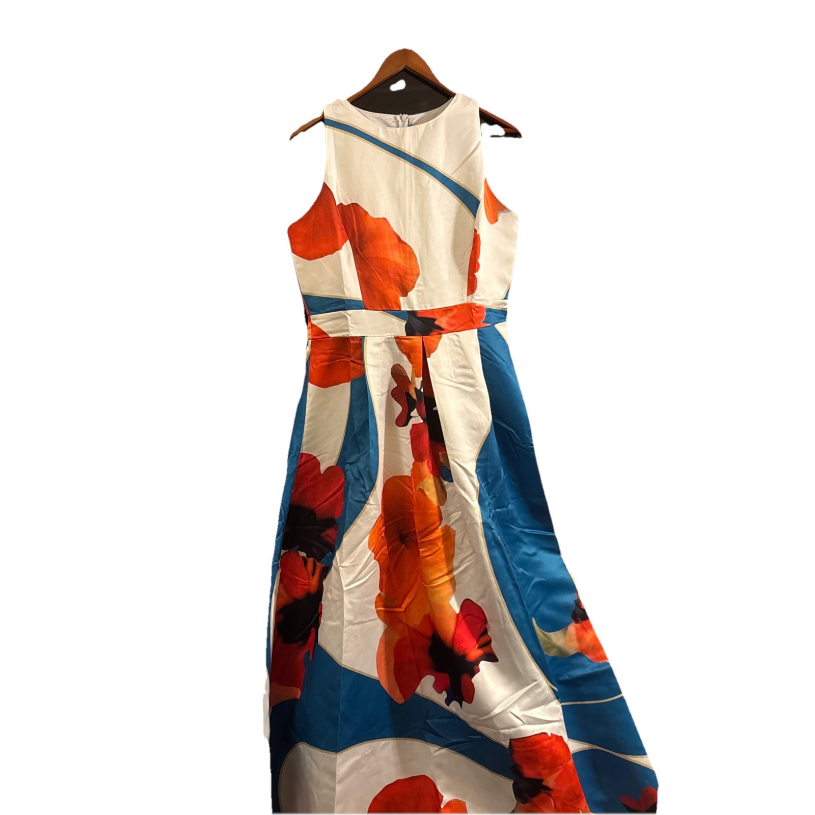 sleeveless maxi dress white with a bold blue, orange, and red floral pattern