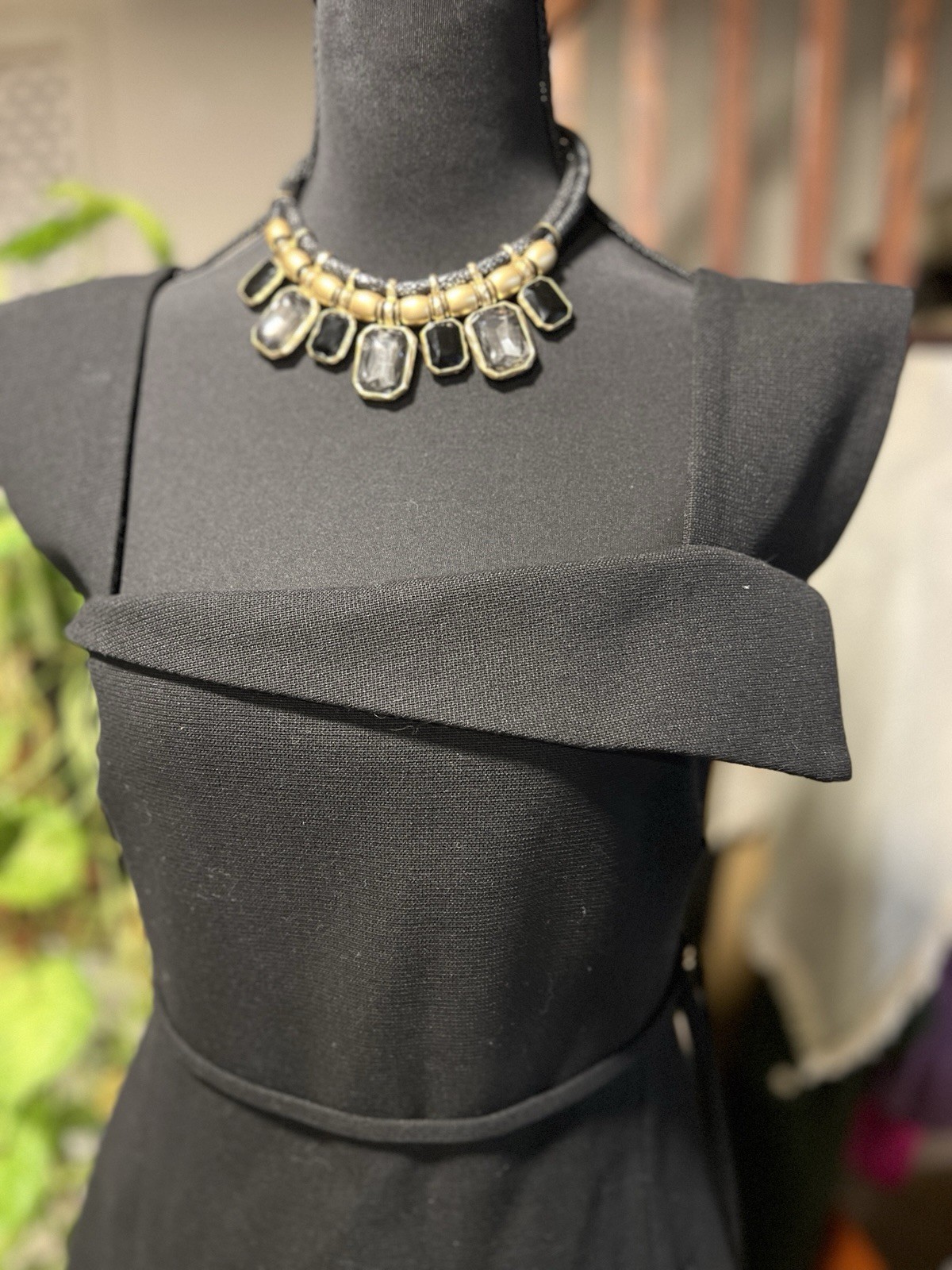 Chic Black Knit Asymmetrical Mini Dress — Modern Sculptural Design