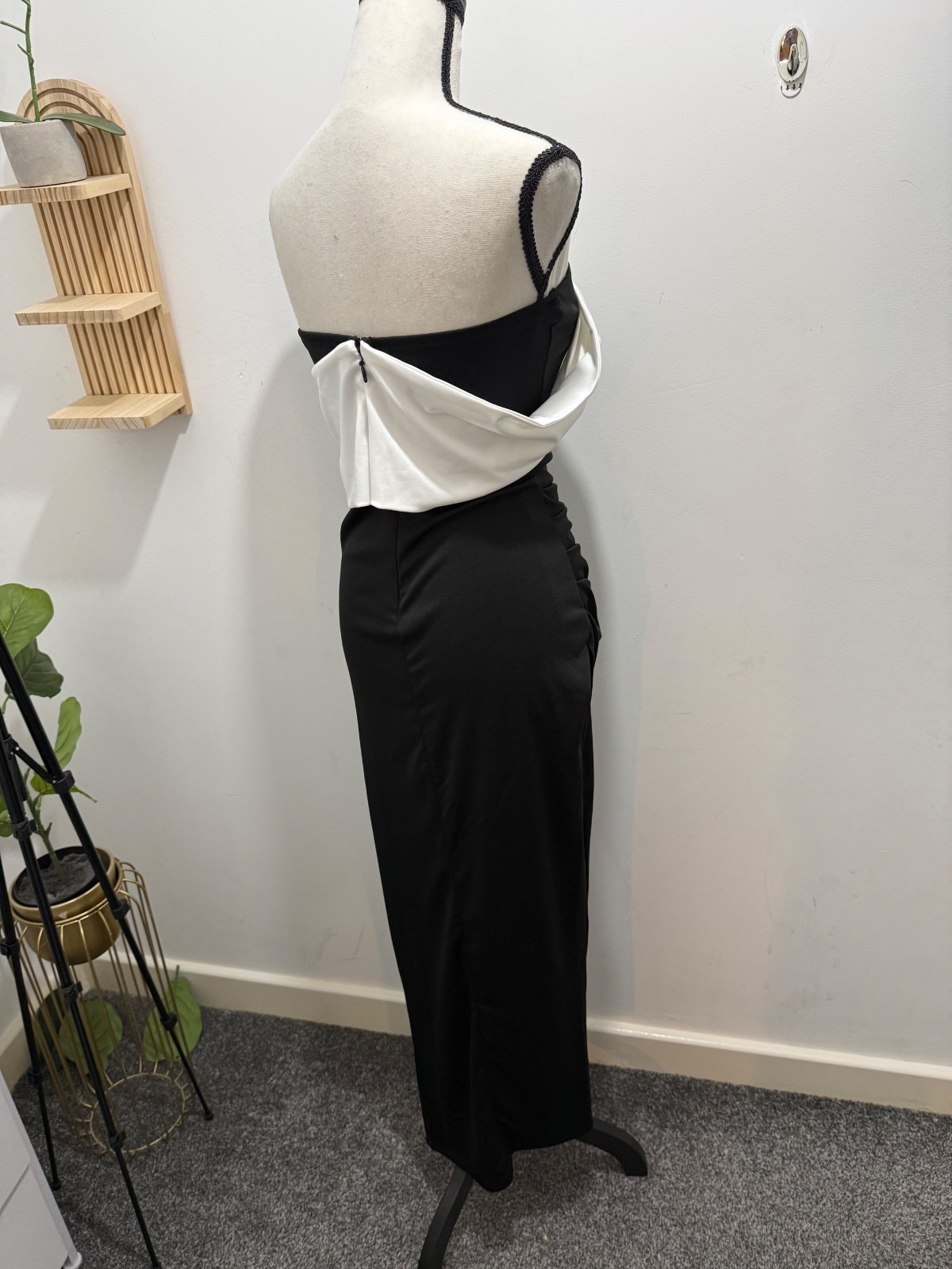 Elegant Black and White Strapless Evening Dress with Draped Bow Detail