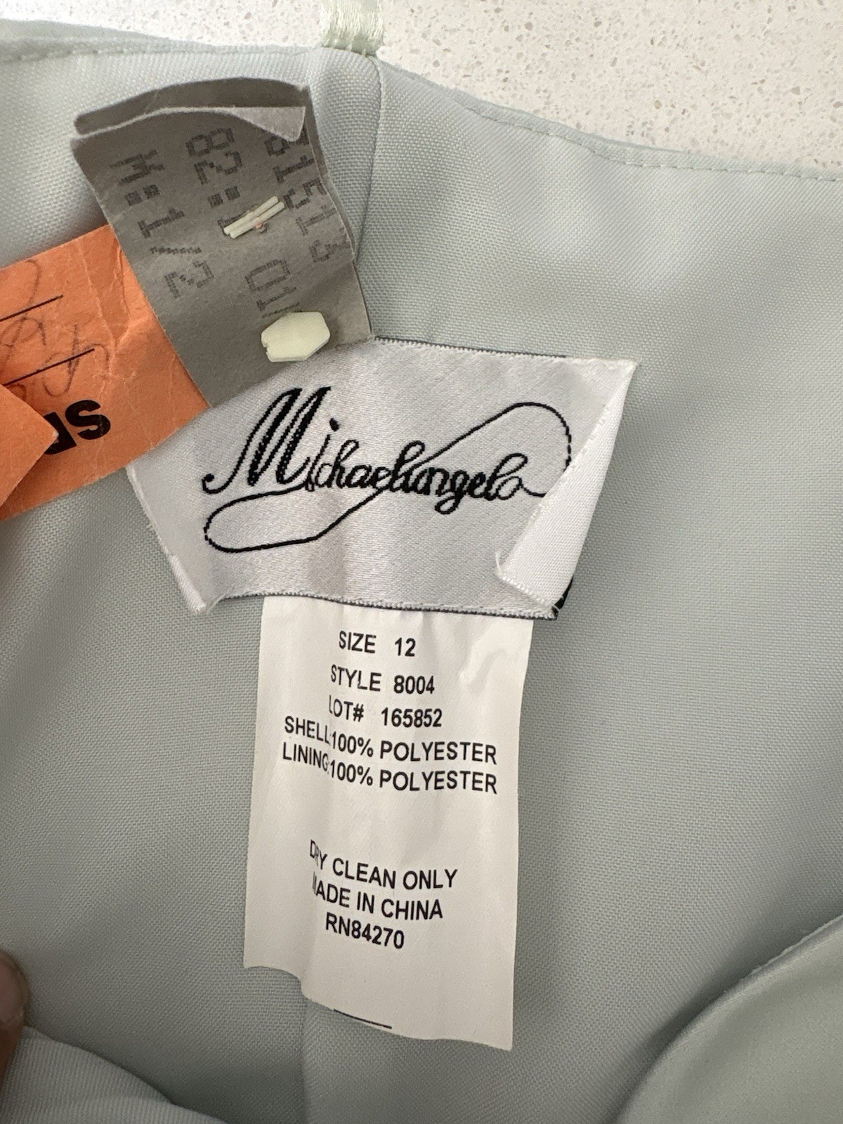 Michaelangelo Pale mint Green satinGown. Size 12. Pre Owned Excellent Condition.