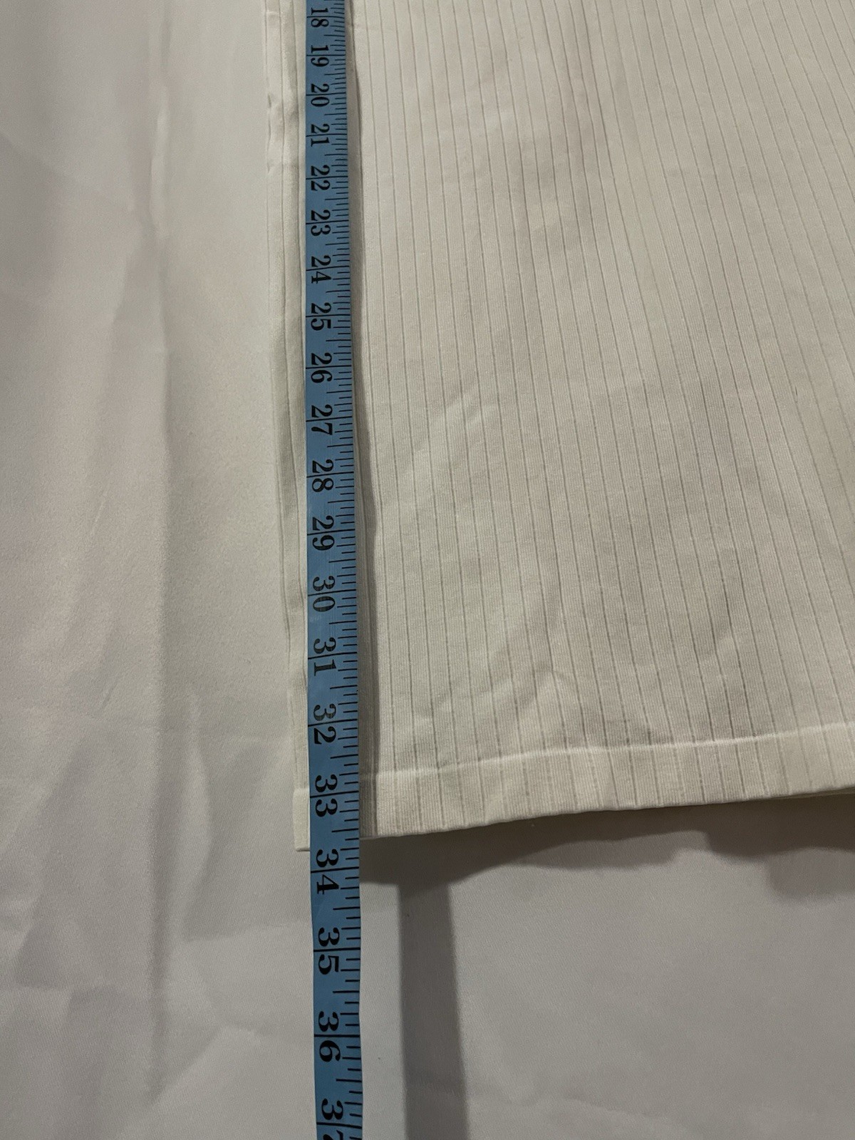 2 women’s dresses: one light blue Shero (size S, wide sleeves) and one white
