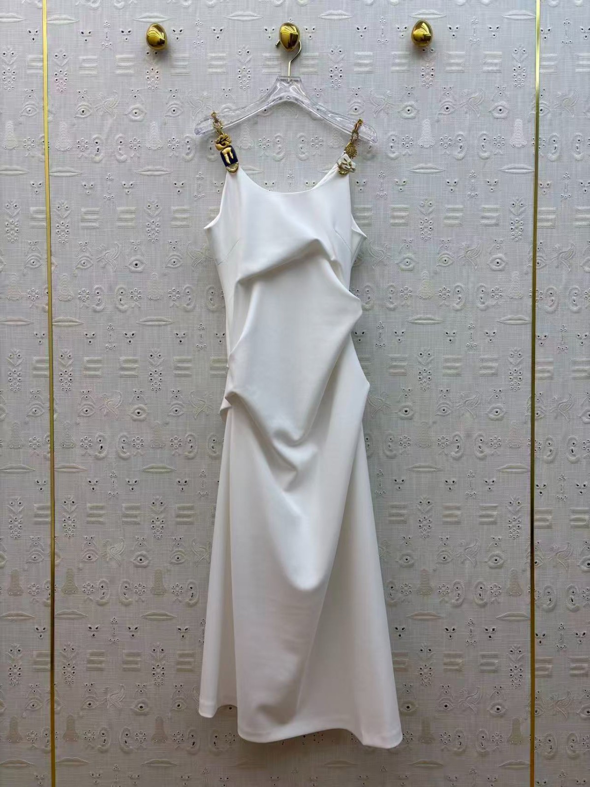 Schiaparelli JEWEL-TWISTED DRESS.