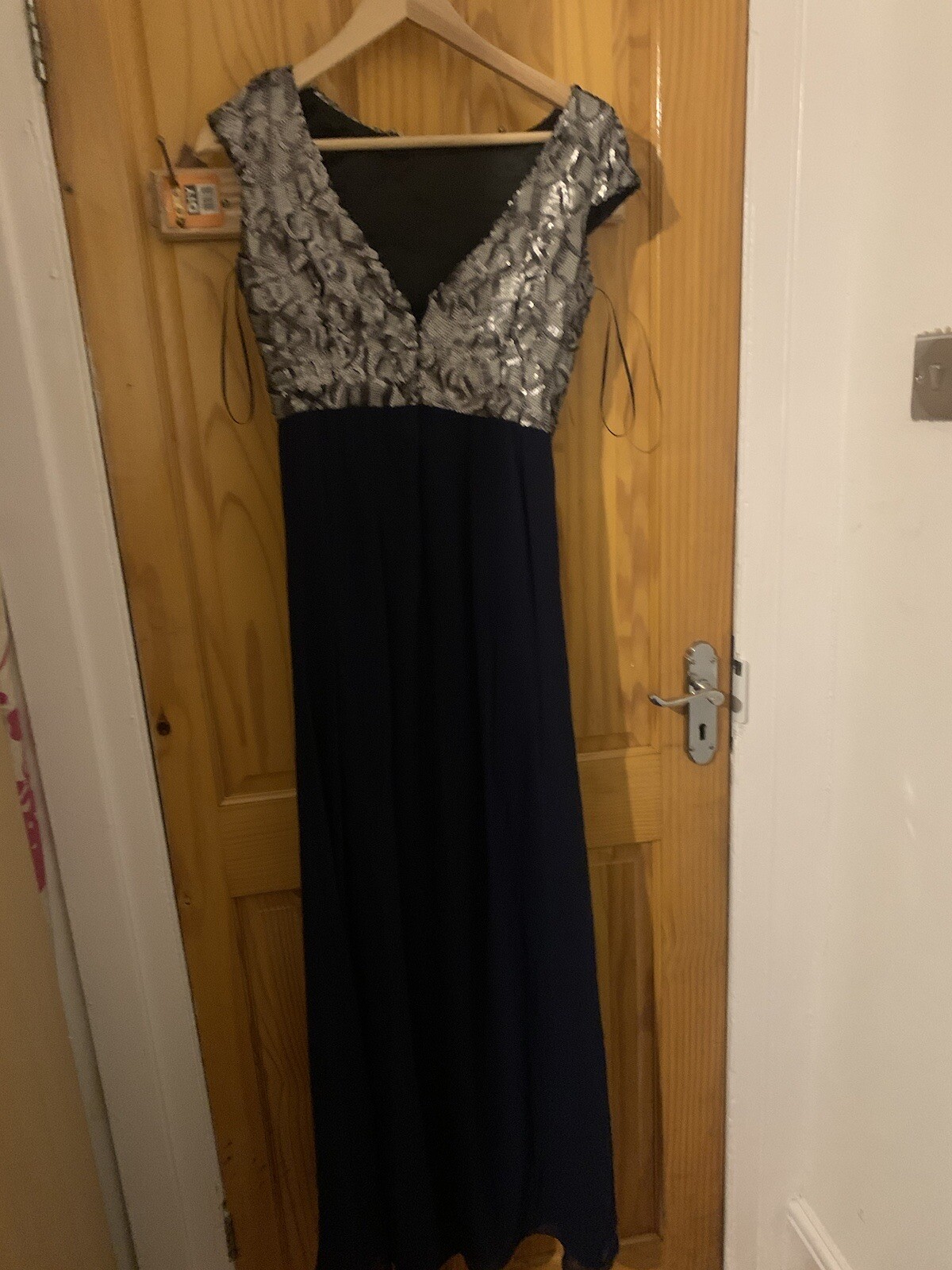 Little Mistress Maxi Dress with hand embellished silver sequins. low cut back.
