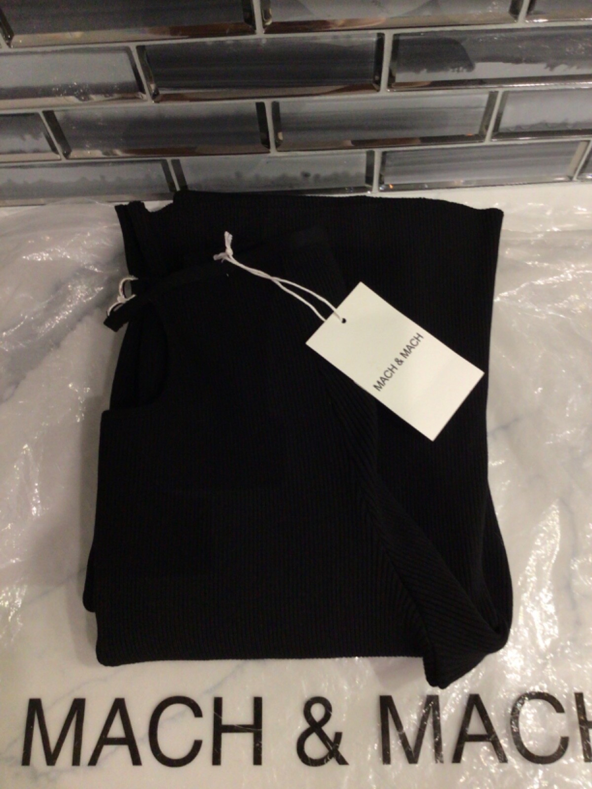 MACH&MACH Black Bow Trousers knit trousers. Cutout and crystal bow accent Size S