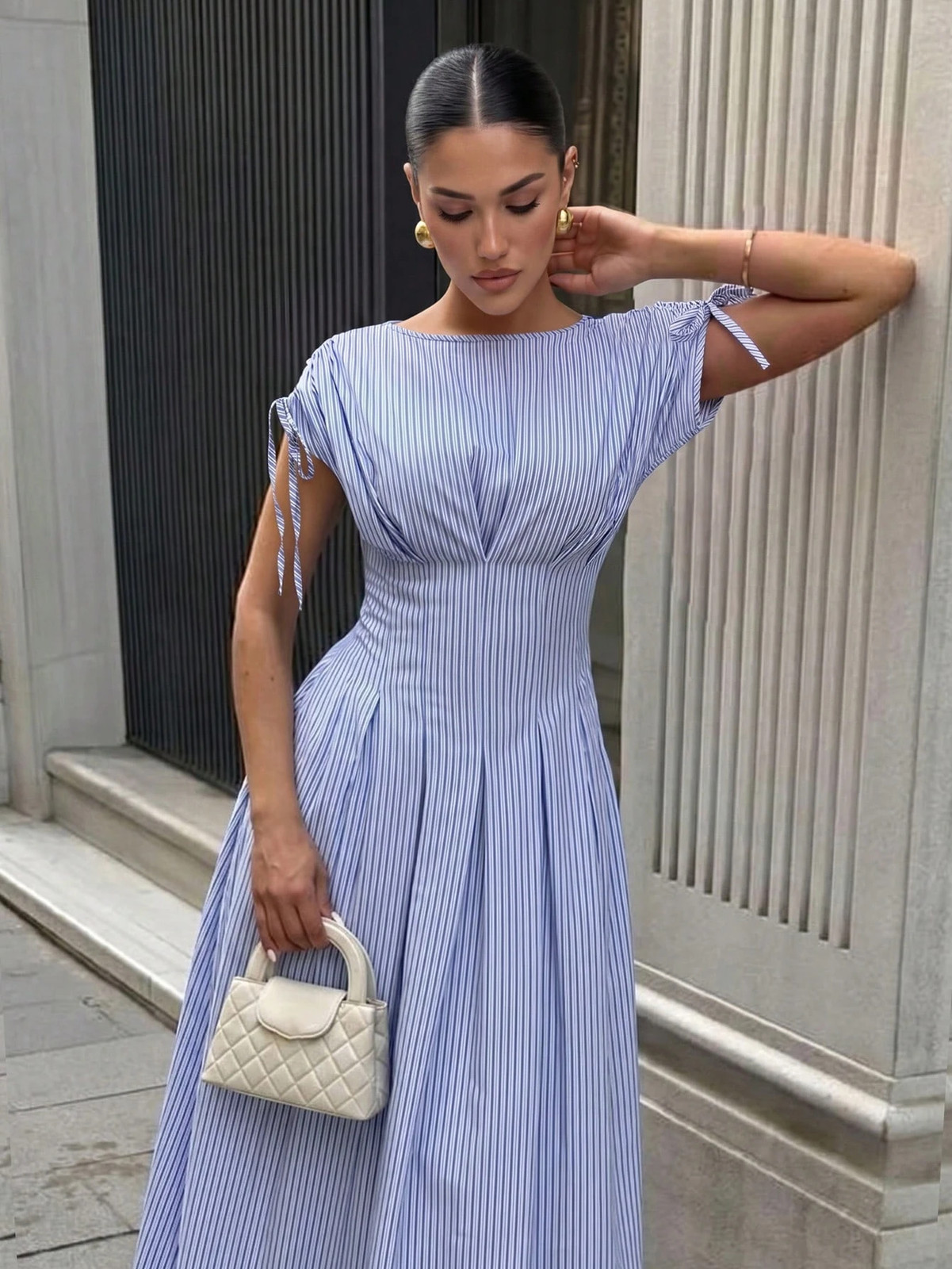 Elegant ladies’ shirt dress in blue white striped