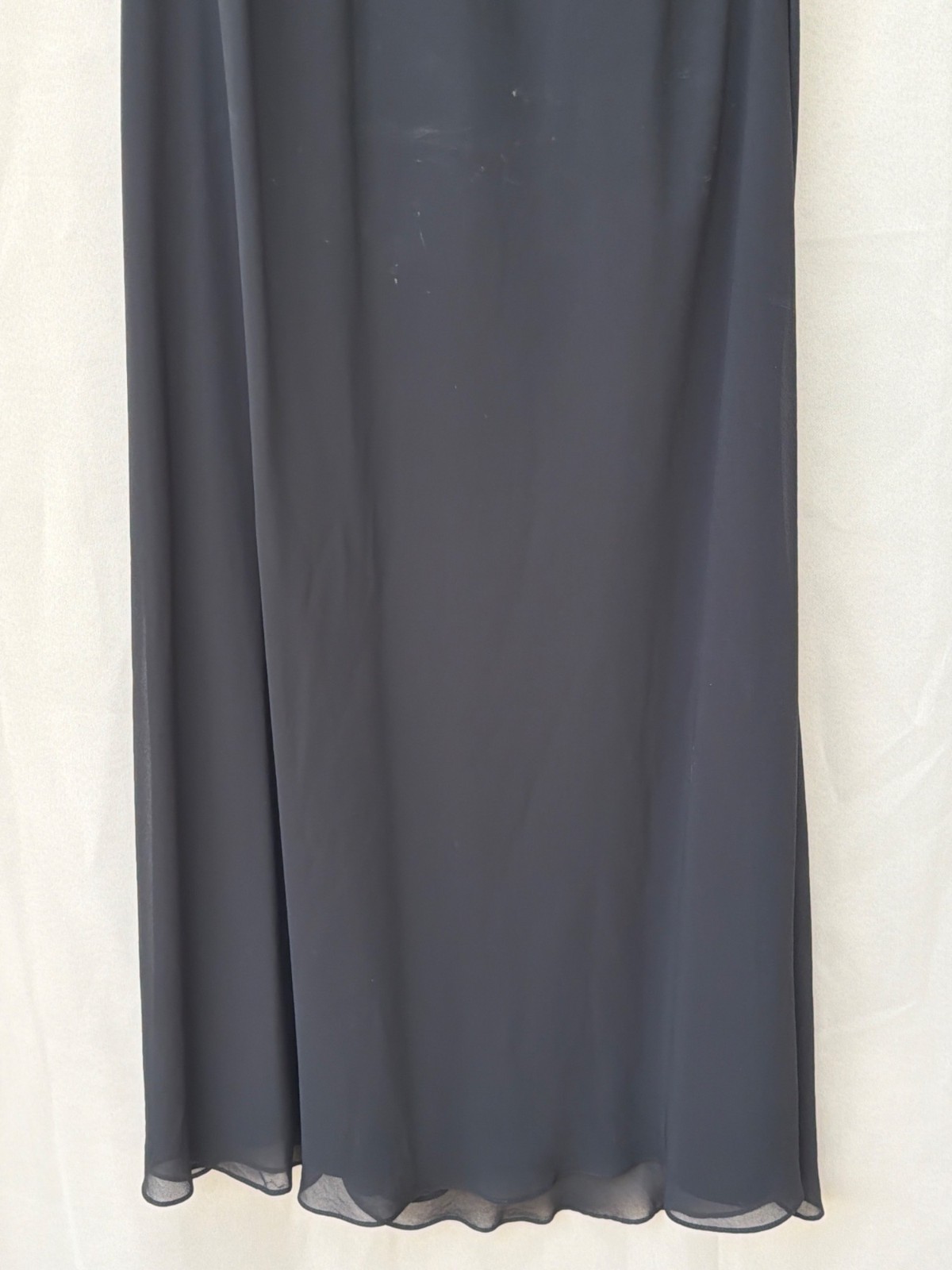 Black Sleeveless Chiffon Dress With Sheer Back & Tiered Ruffle Accent Mid-Length