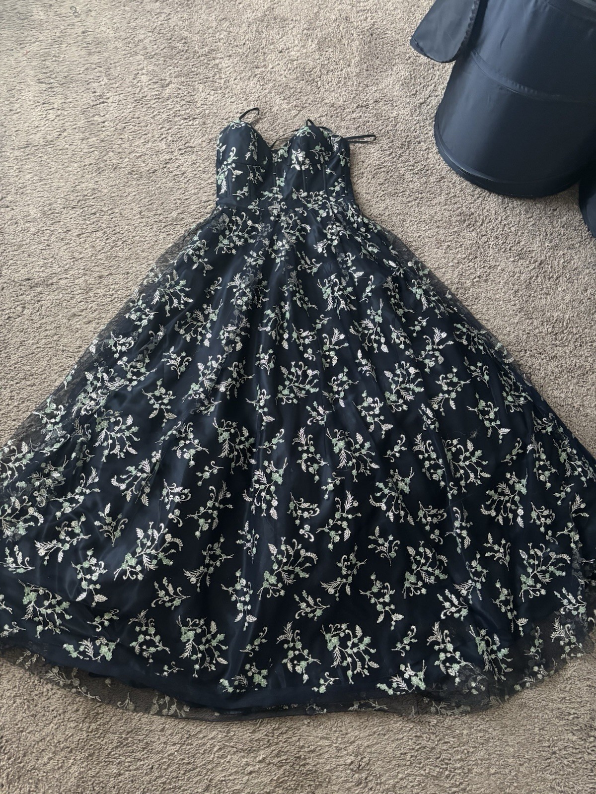 Navy blue corseted glittery floral ballgown with silver and muted teal accents.