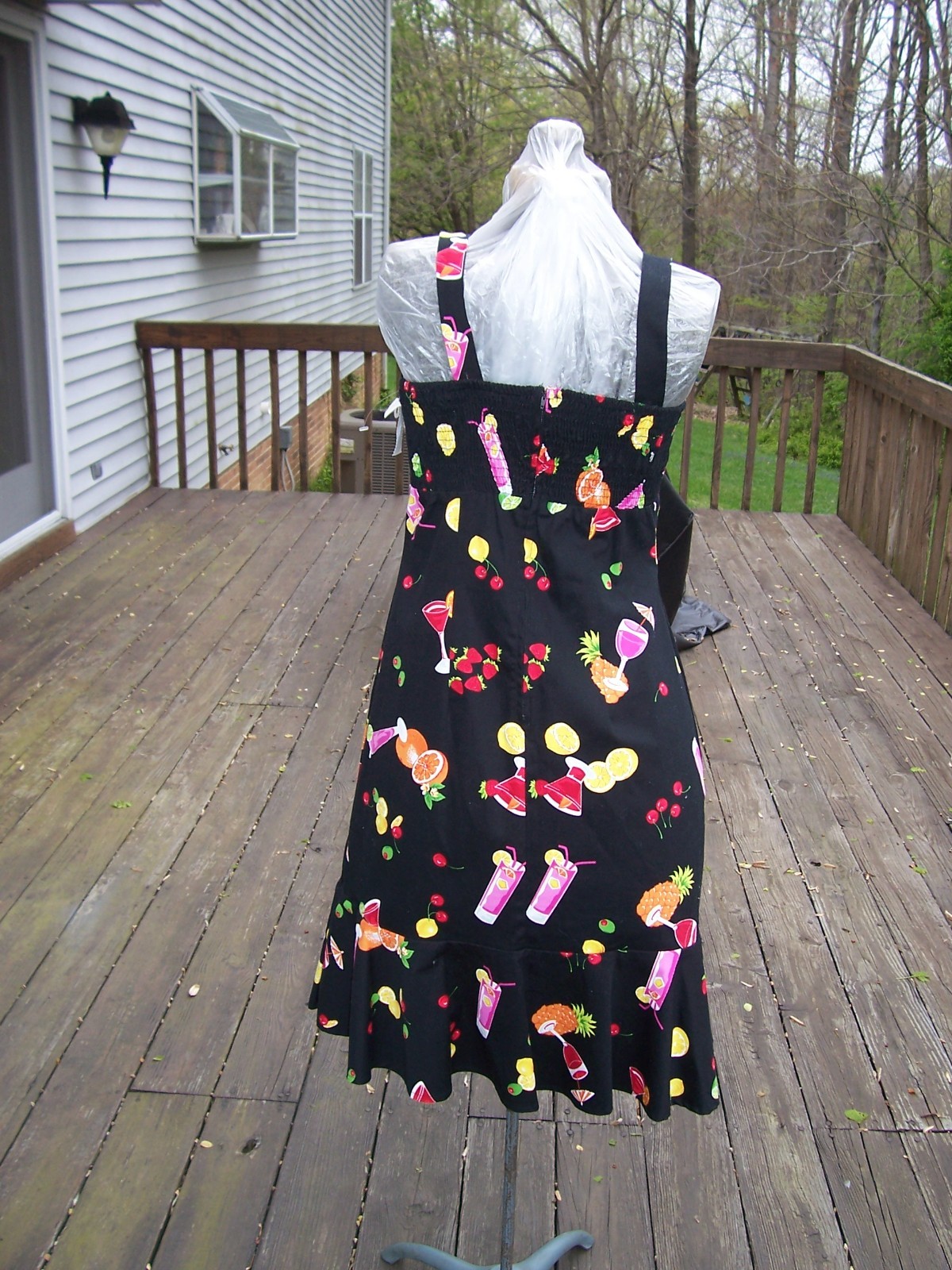Black Sundress with Colorful Flare Cute dress with fun fruit and cocktail motif.
