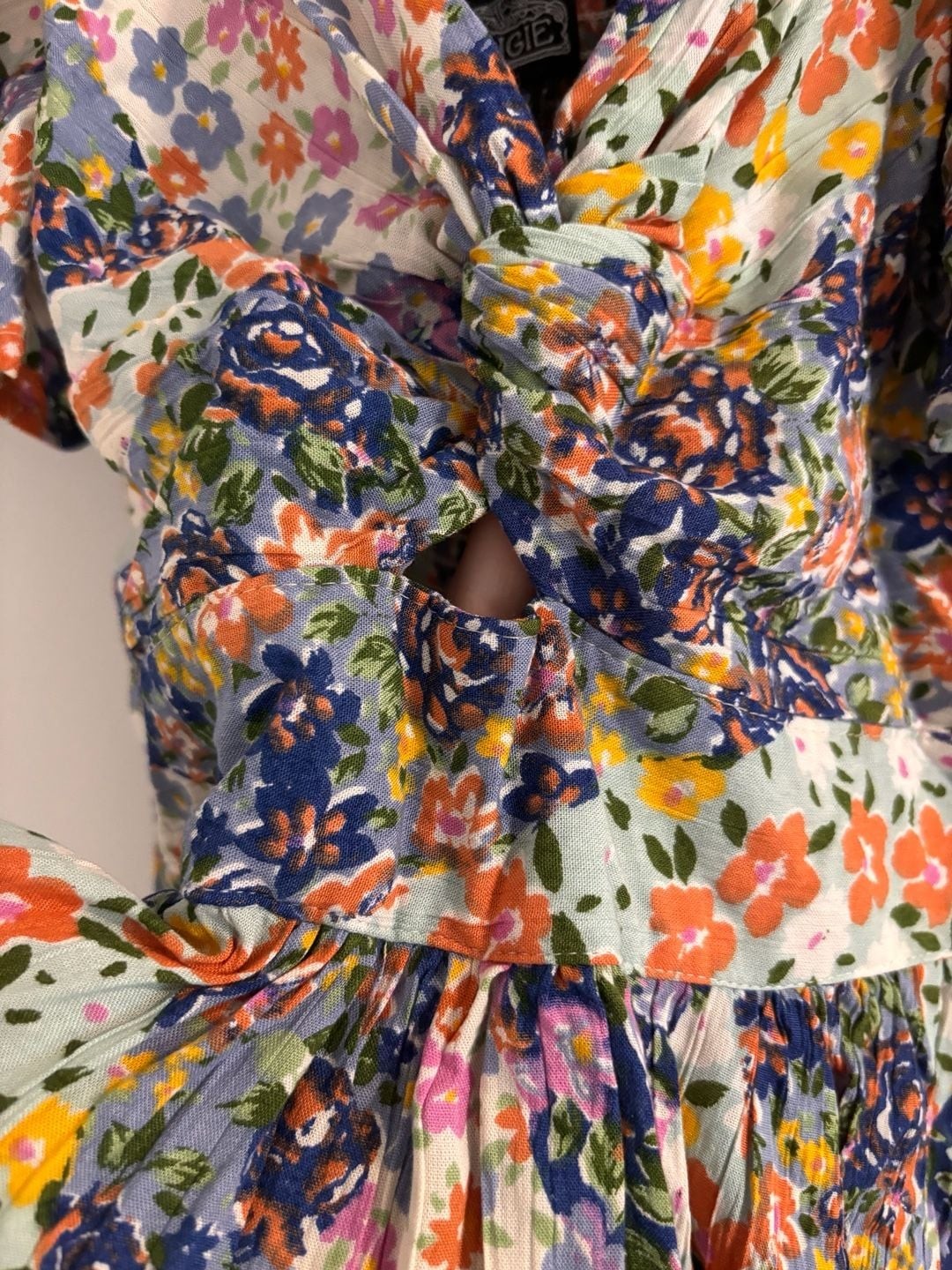 Angie Floral Print Patchwork Mini Dress with Puff Sleeves and Front Twist