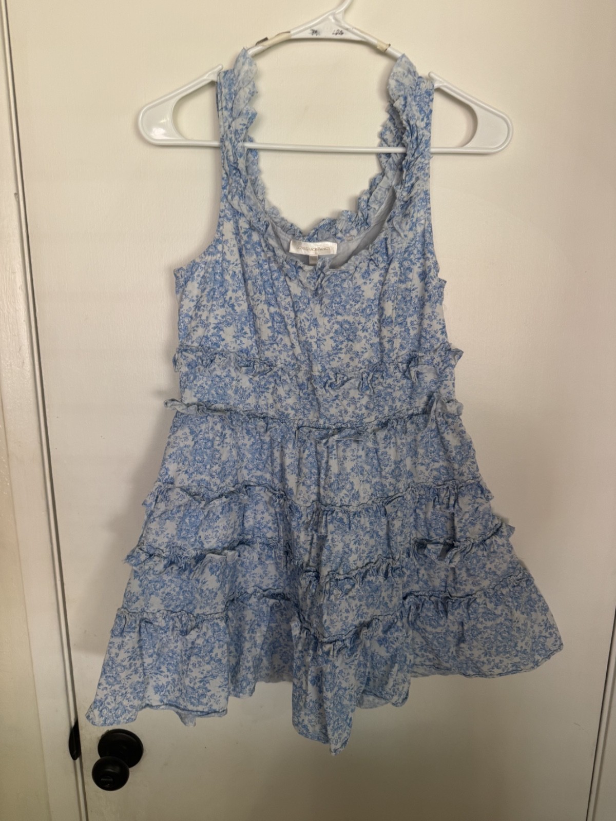 Women “Love Shack Fancy” blue/white sleeveless ruffeled short dress. Size 6