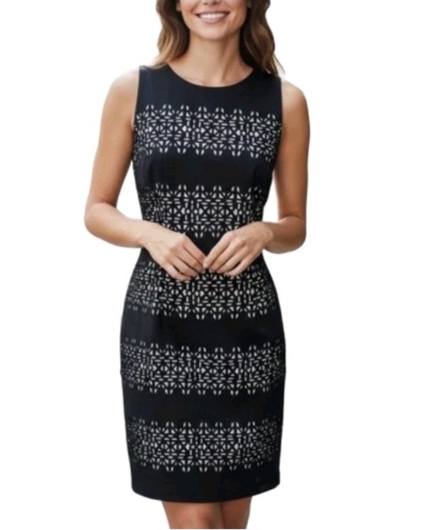 White House Black Market~Woman Size 0~Black Laser Cut-out Sleeveless Dress Lined