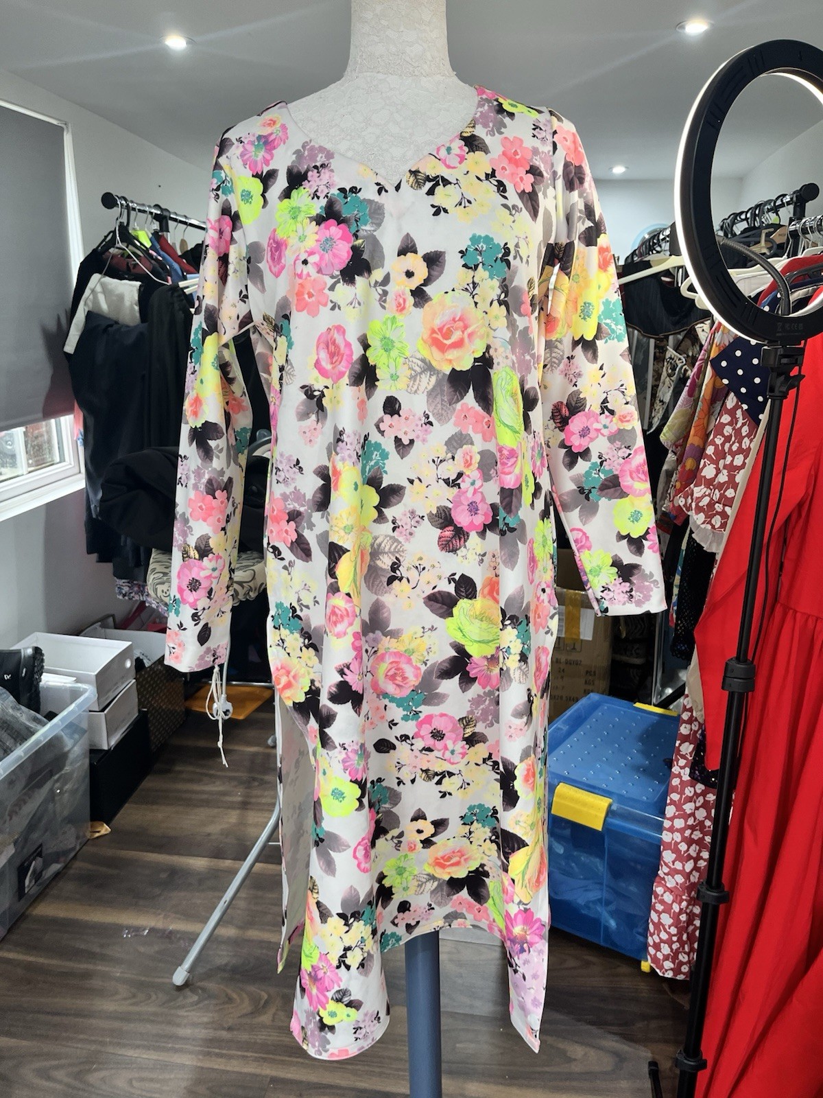 floral chiffon abaya-style dress, featuring lightweight fabric and long sleeves.