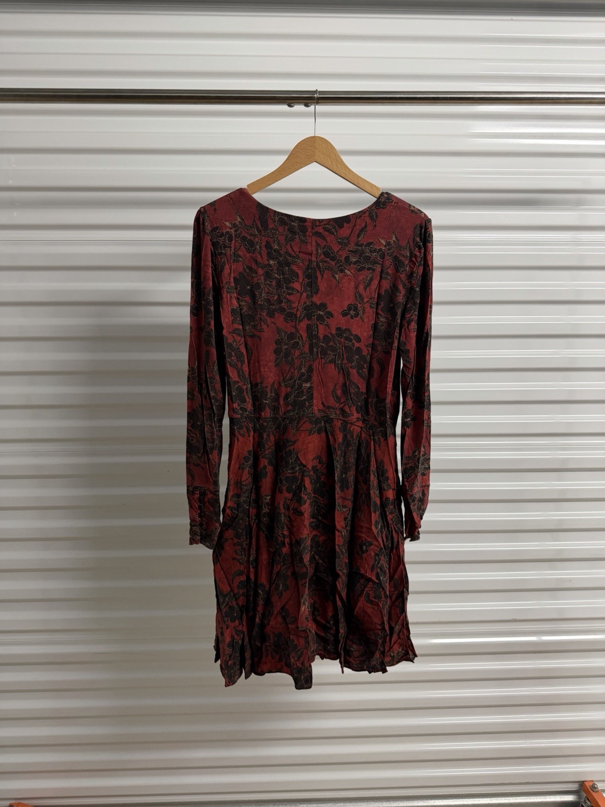 Peruvian Connection dress, featuring a red and black floral print