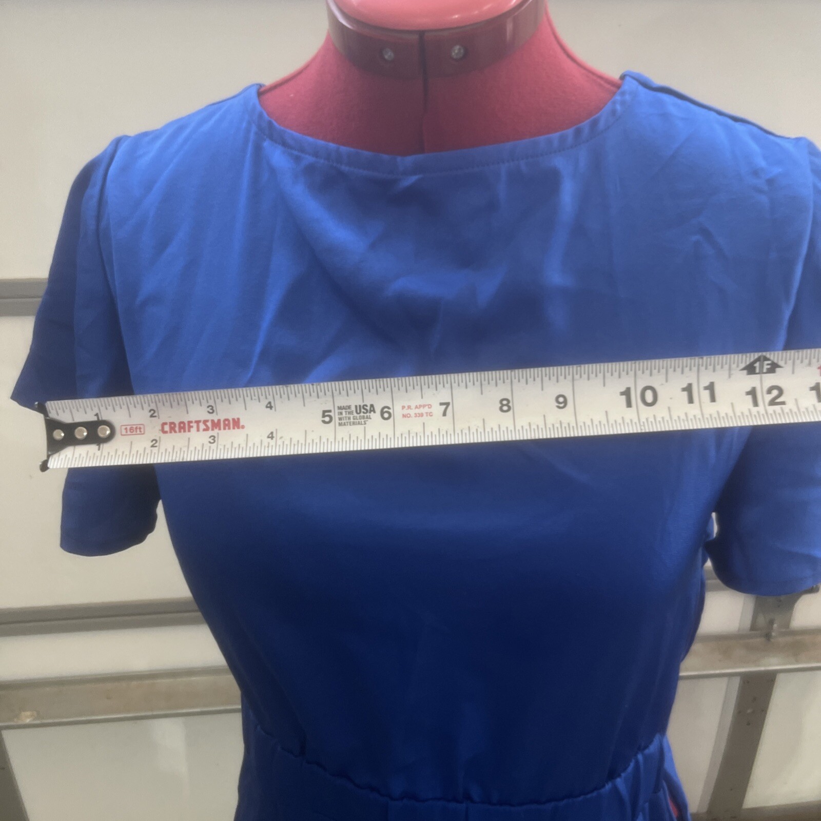Blue Polyester/ Spandex Light And Flowy Dress Size M, Sinched Front.