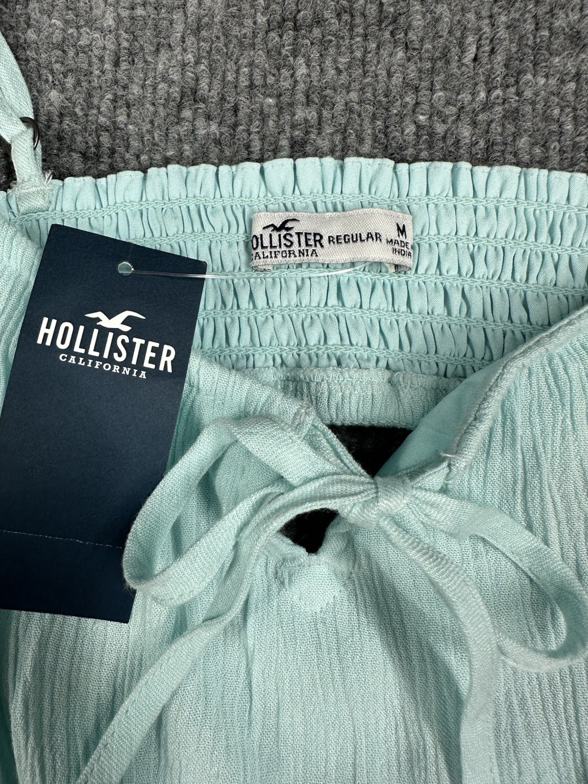 Hollister Womens M Turquoise Viscose Mini Romper Tie Front Smocked Coquette NWT