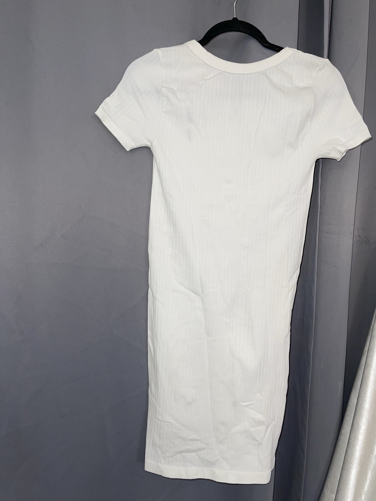 2 women’s dresses: one light blue Shero (size S, wide sleeves) and one white