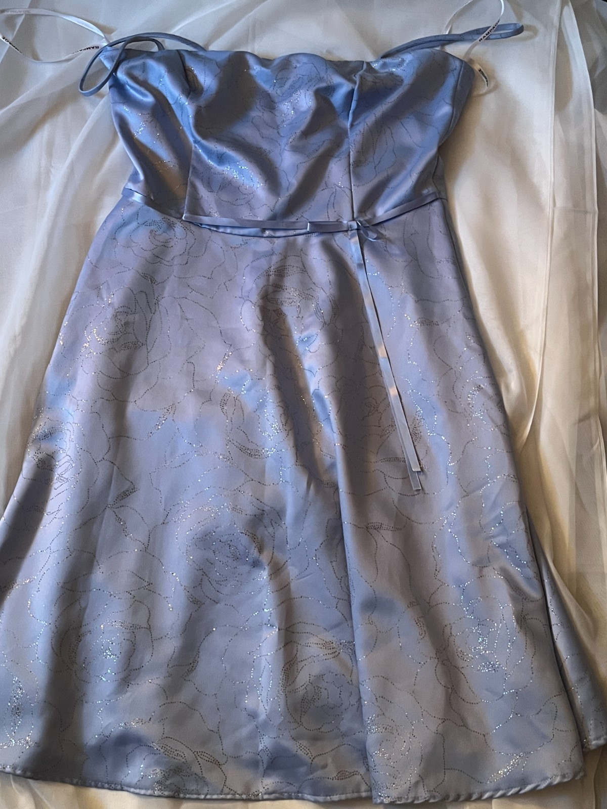 Beautiful Bleu Dress with Glitters, and a bow at the waist size 13 from Rampage