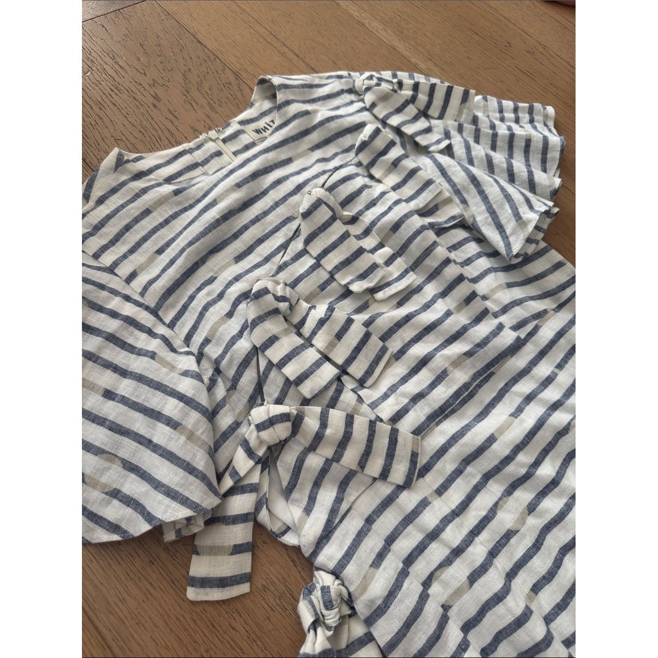 WHIT striped linen shift dress features flutter sleeves and a side tie accents