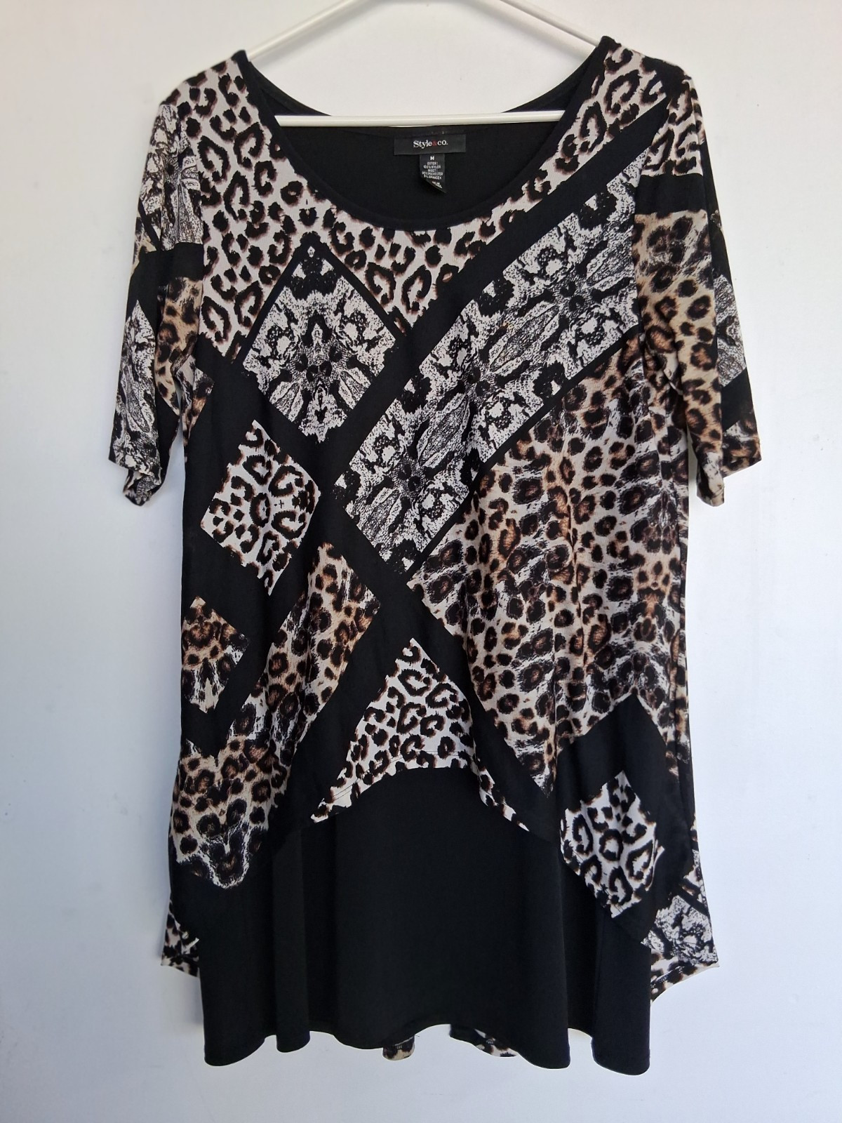 Size M black white brown knee length dress, pattern over sheath. Excellent cond
