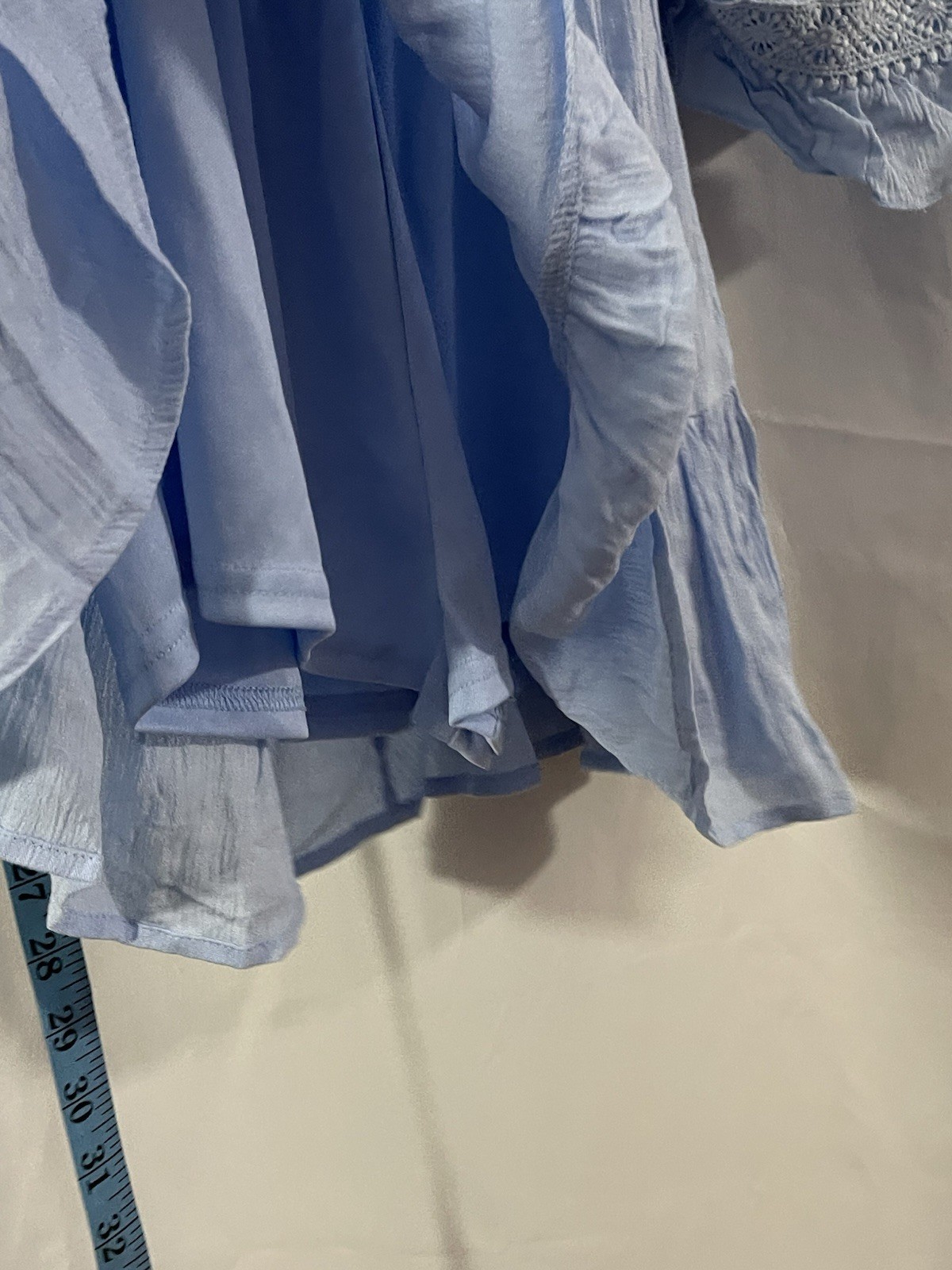 2 women’s dresses: one light blue Shero (size S, wide sleeves) and one white