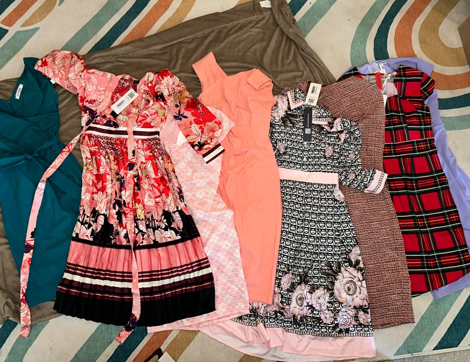 8 Women’s dresses! 6 are new with tags, excellent condition. Retail $500